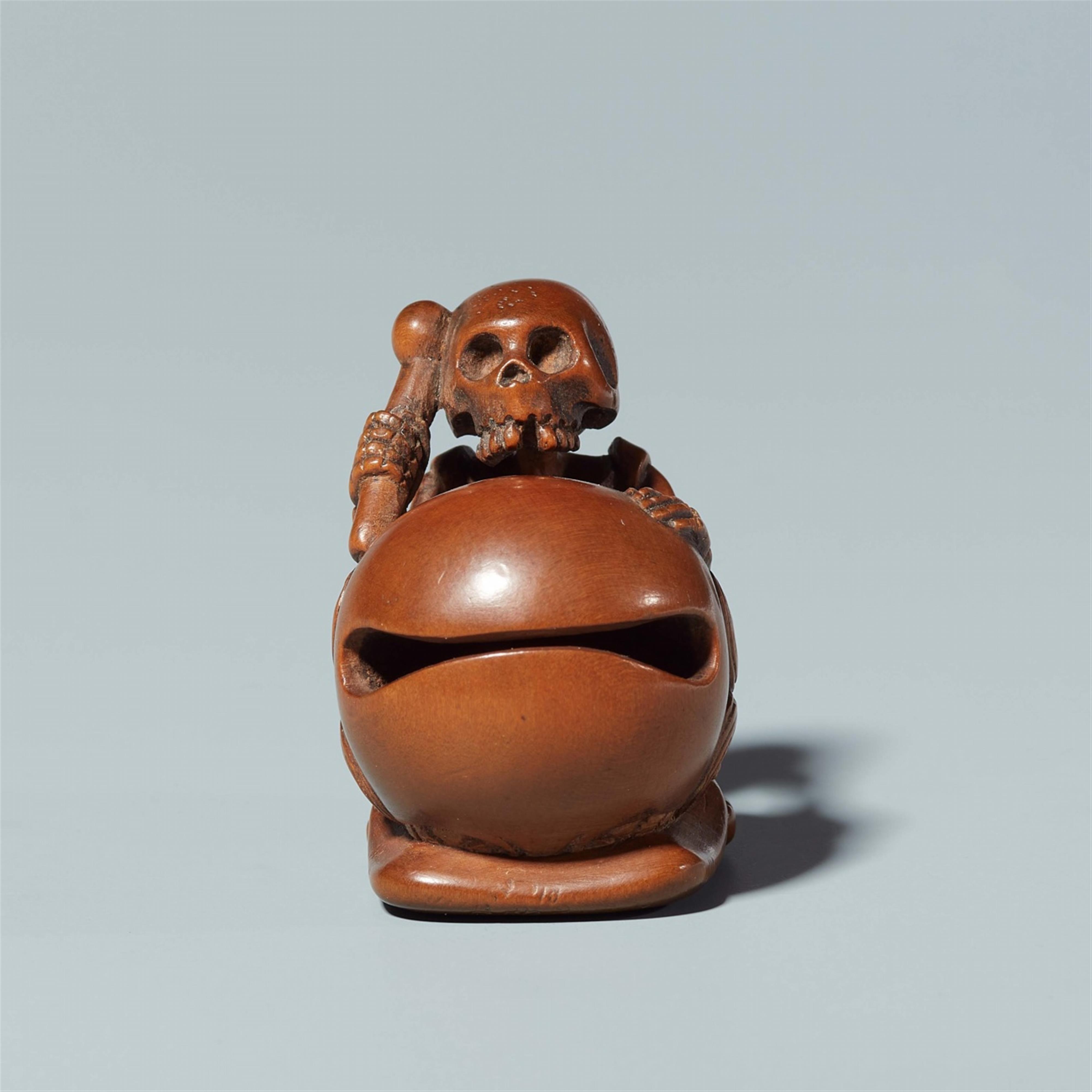 A wood netsuke of a skeleton with a bell. First half 19th century - image-3