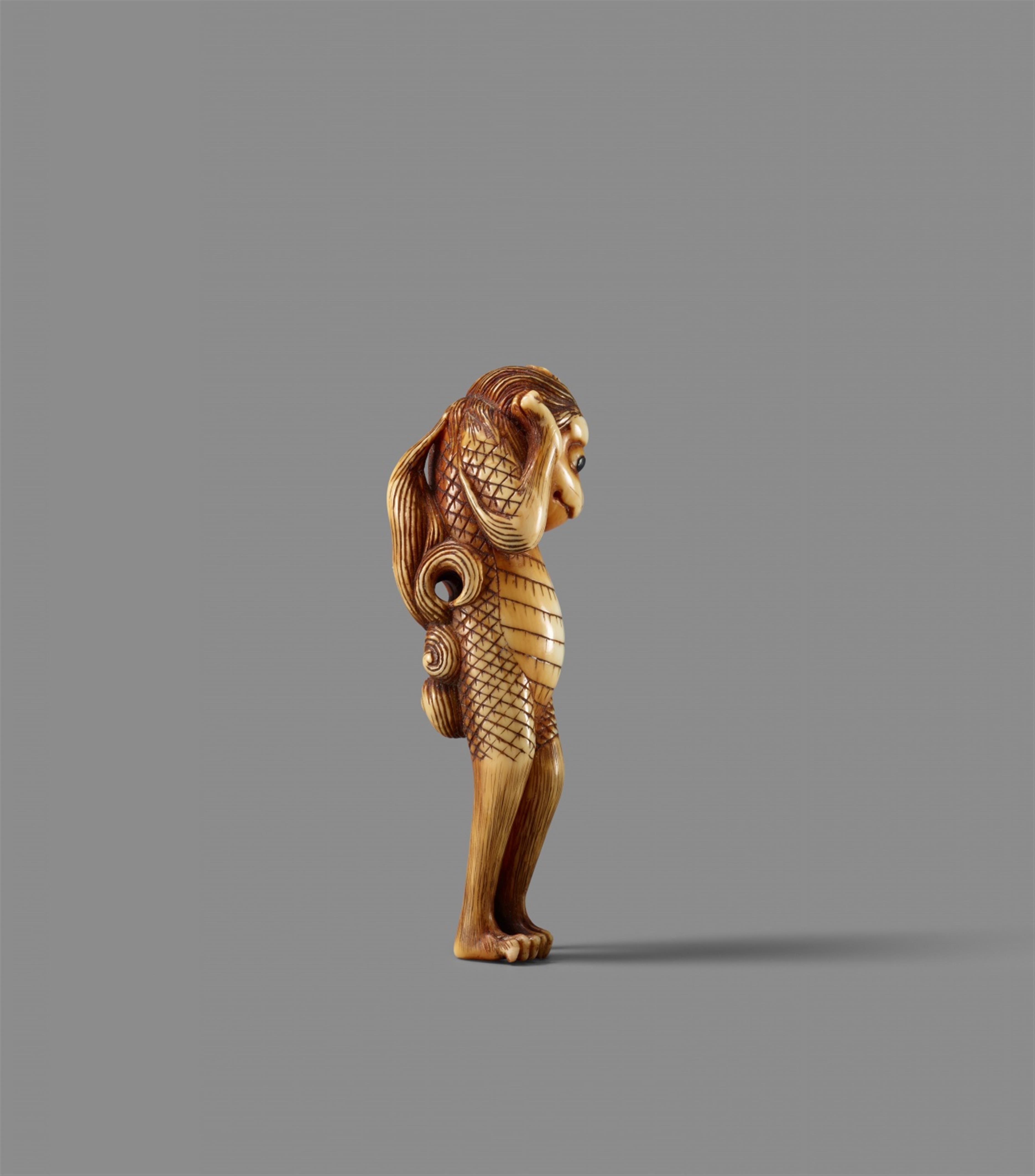 An ivory netsuke of a mythological animal. 19th century - image-2