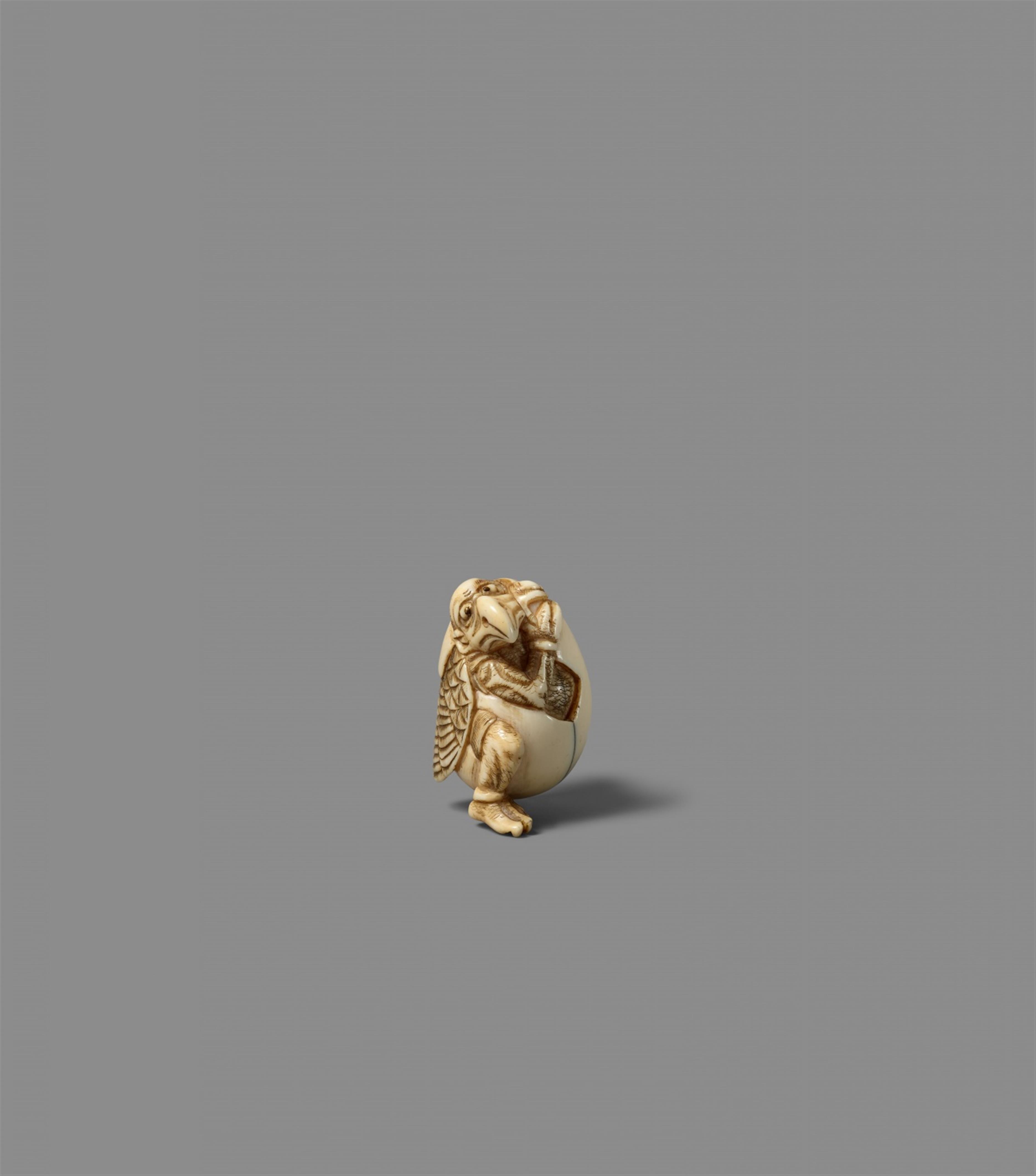 An ivory netsuke of a tengu hatching out of its egg. 19th century - image-2