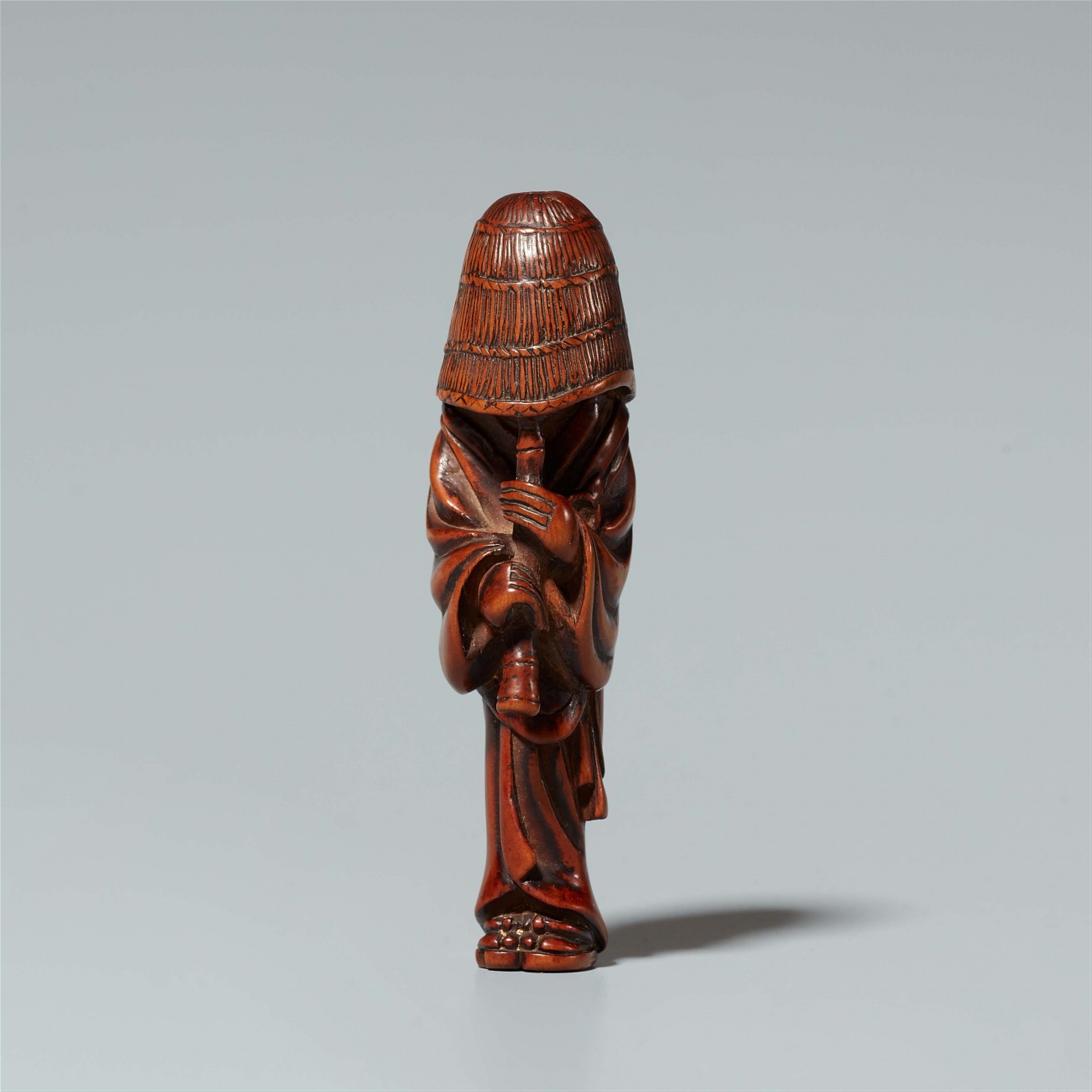 A boxwood netsuke of a Komusô monk. Around 1800 - image-1