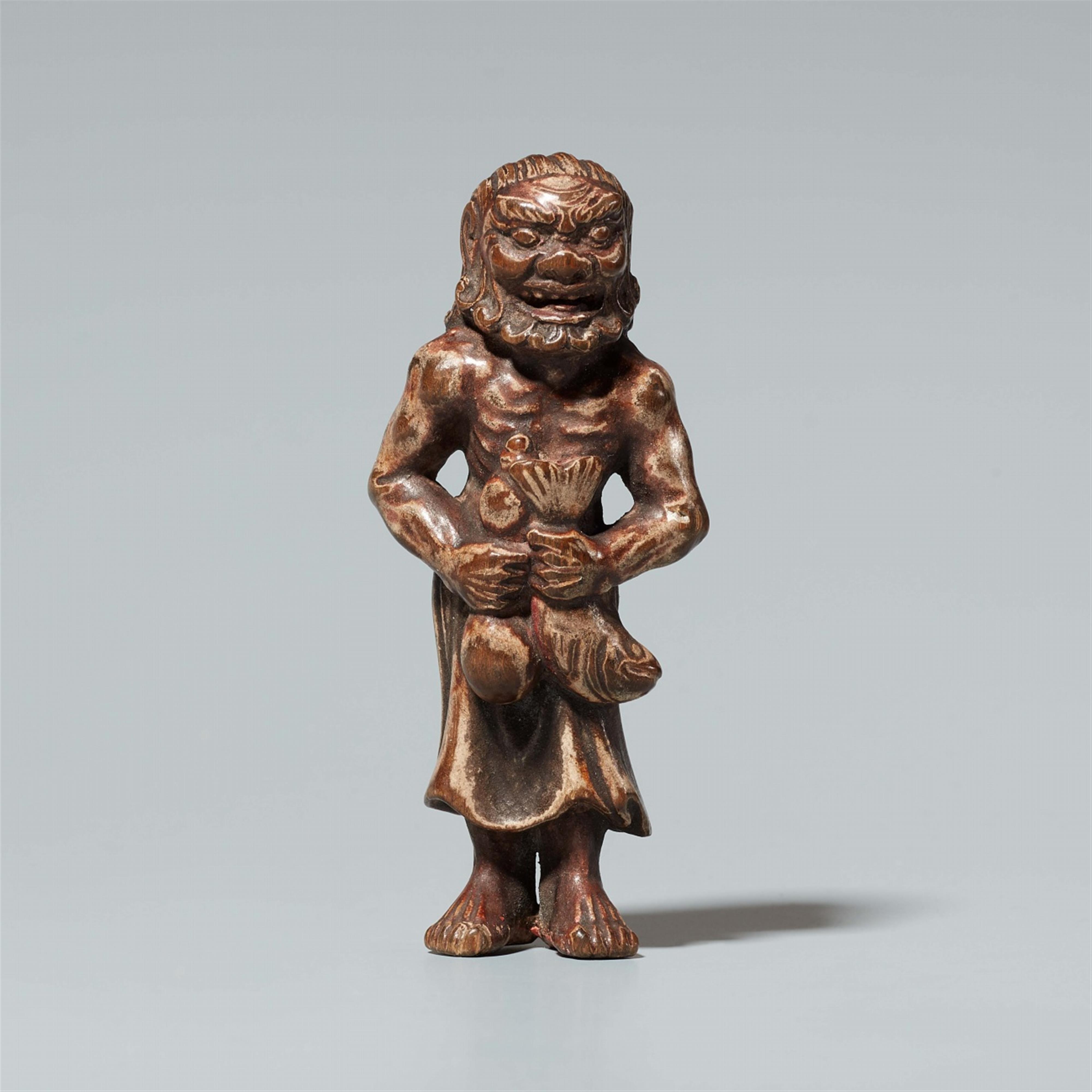 A Shûzan-style wood and lacquer netsuke of a standing fisherman. 18th century - image-1