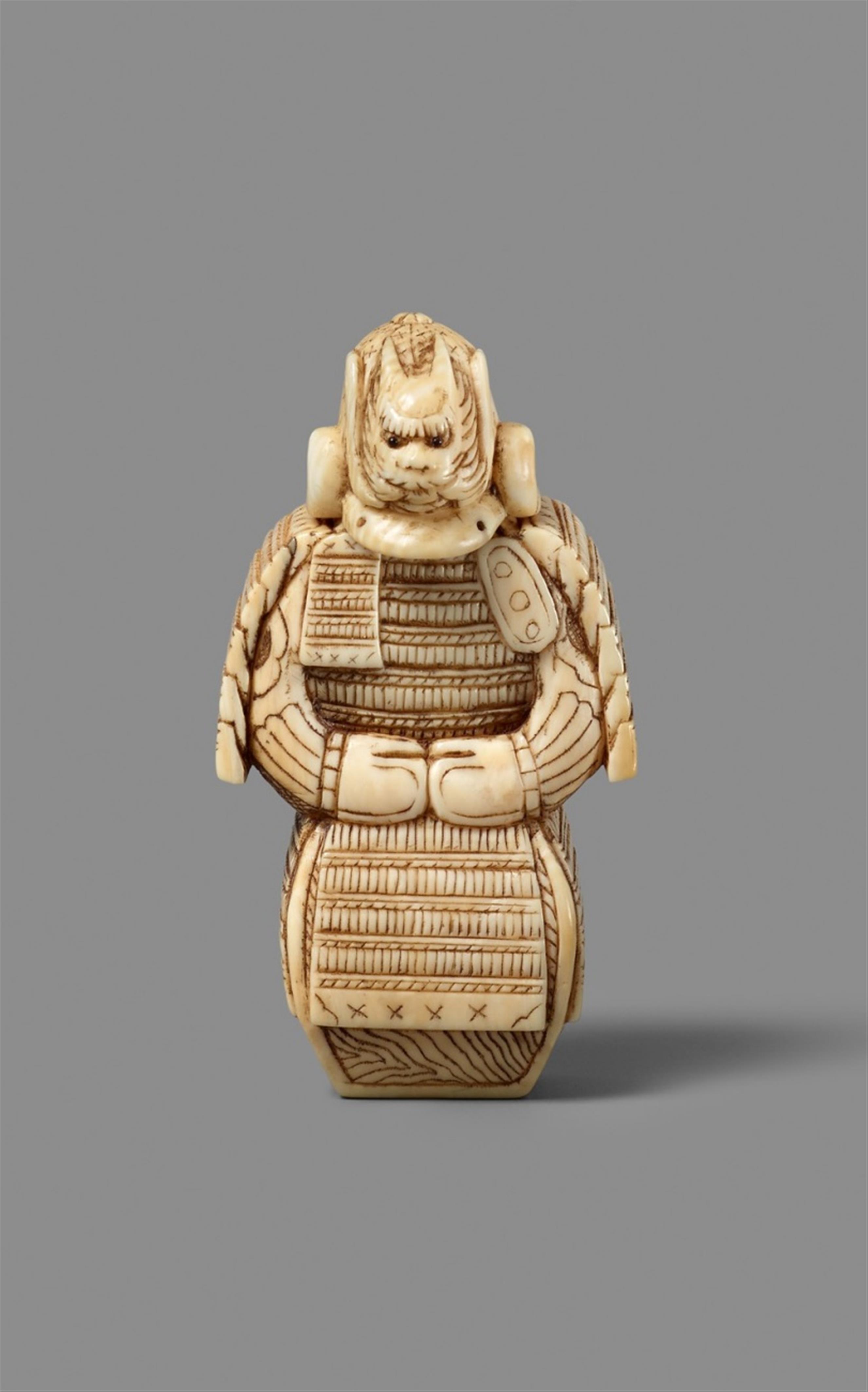 An ivory netsuke of armour (yoroi) on its box. 19th century - image-1