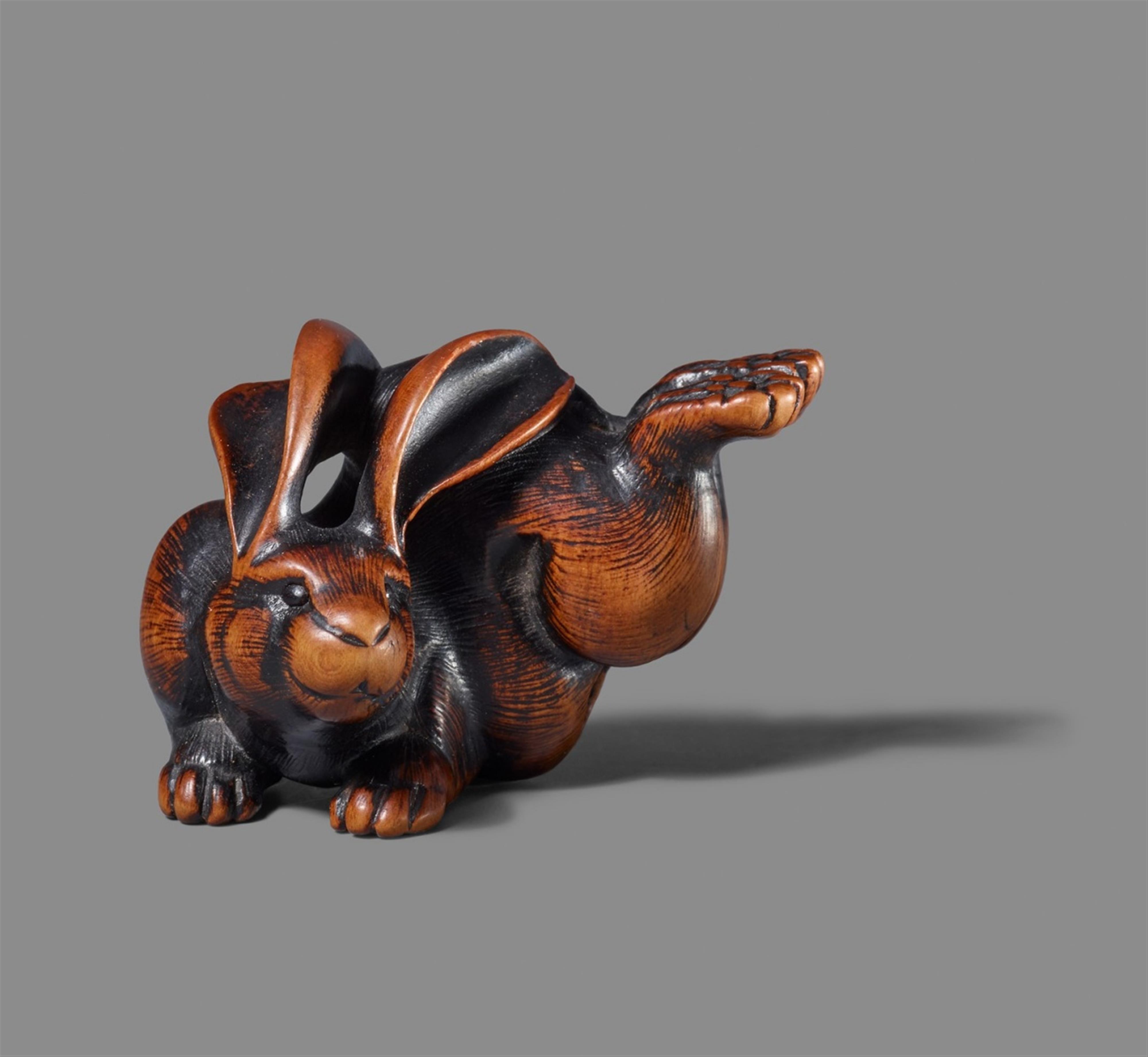 A  boxwood netsuke of a leaping hare. 19th century - image-2