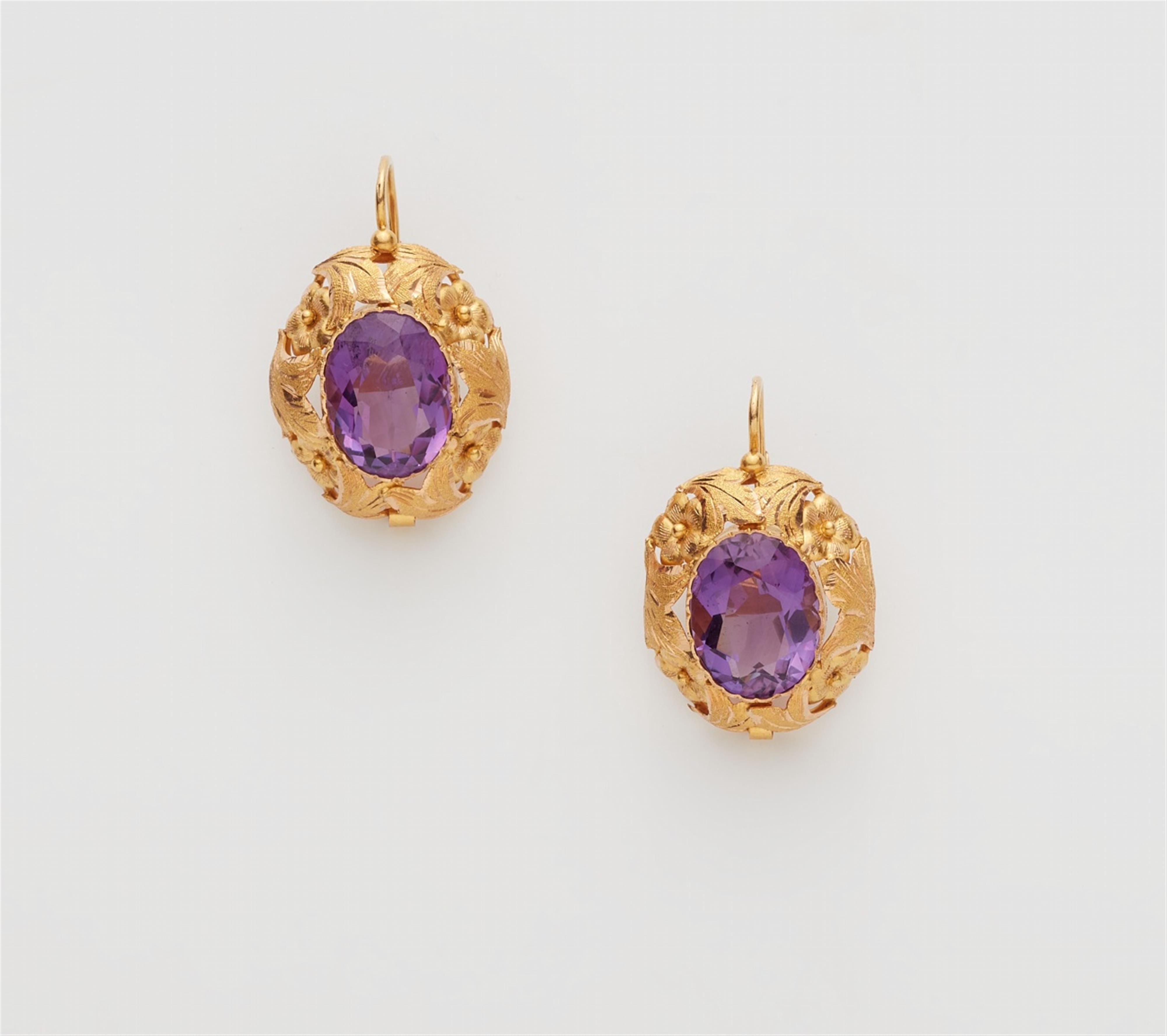 A pair of 14k gold amethyst earrings - image-1
