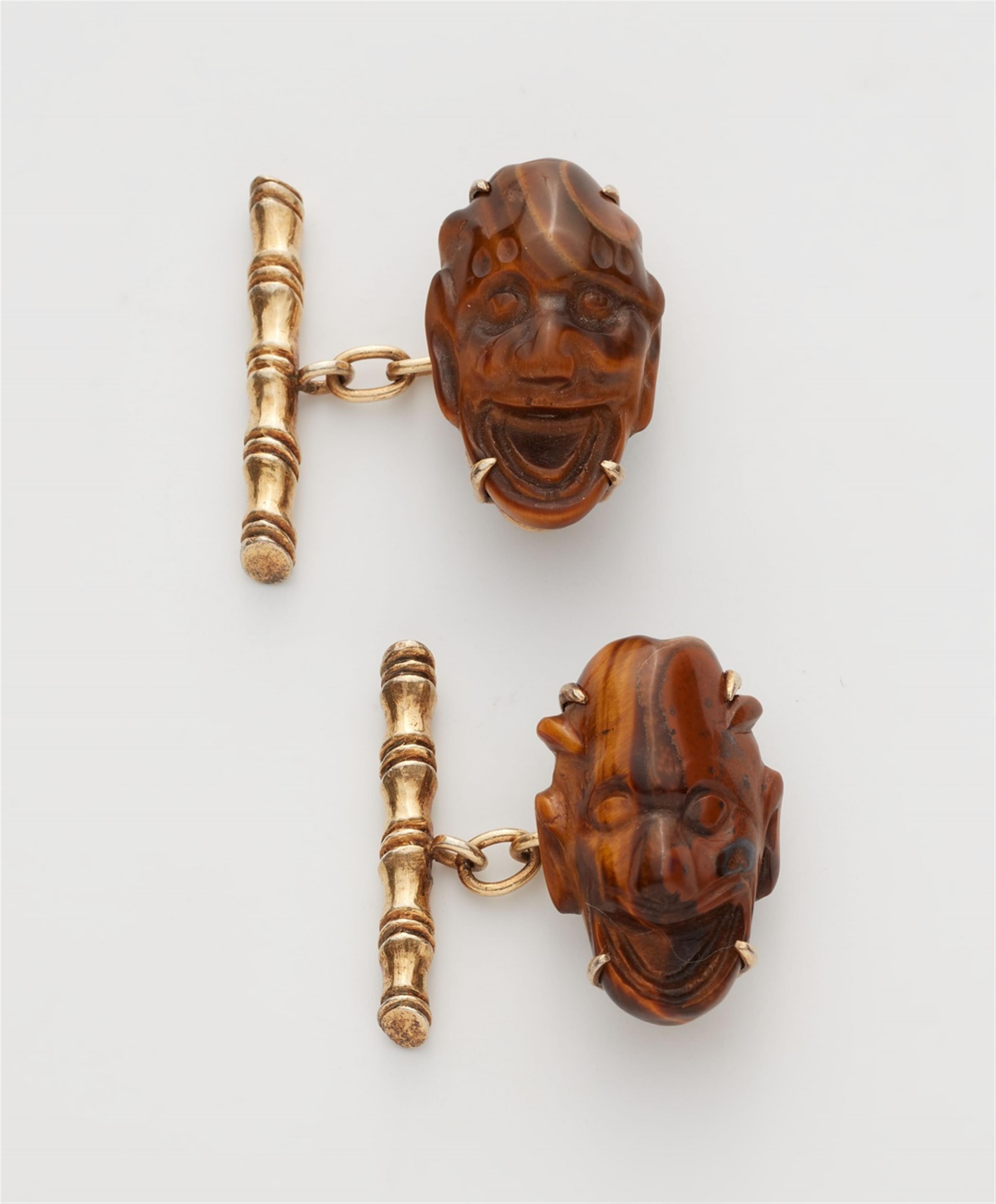 A pair of tiger's eye cufflinks - image-1