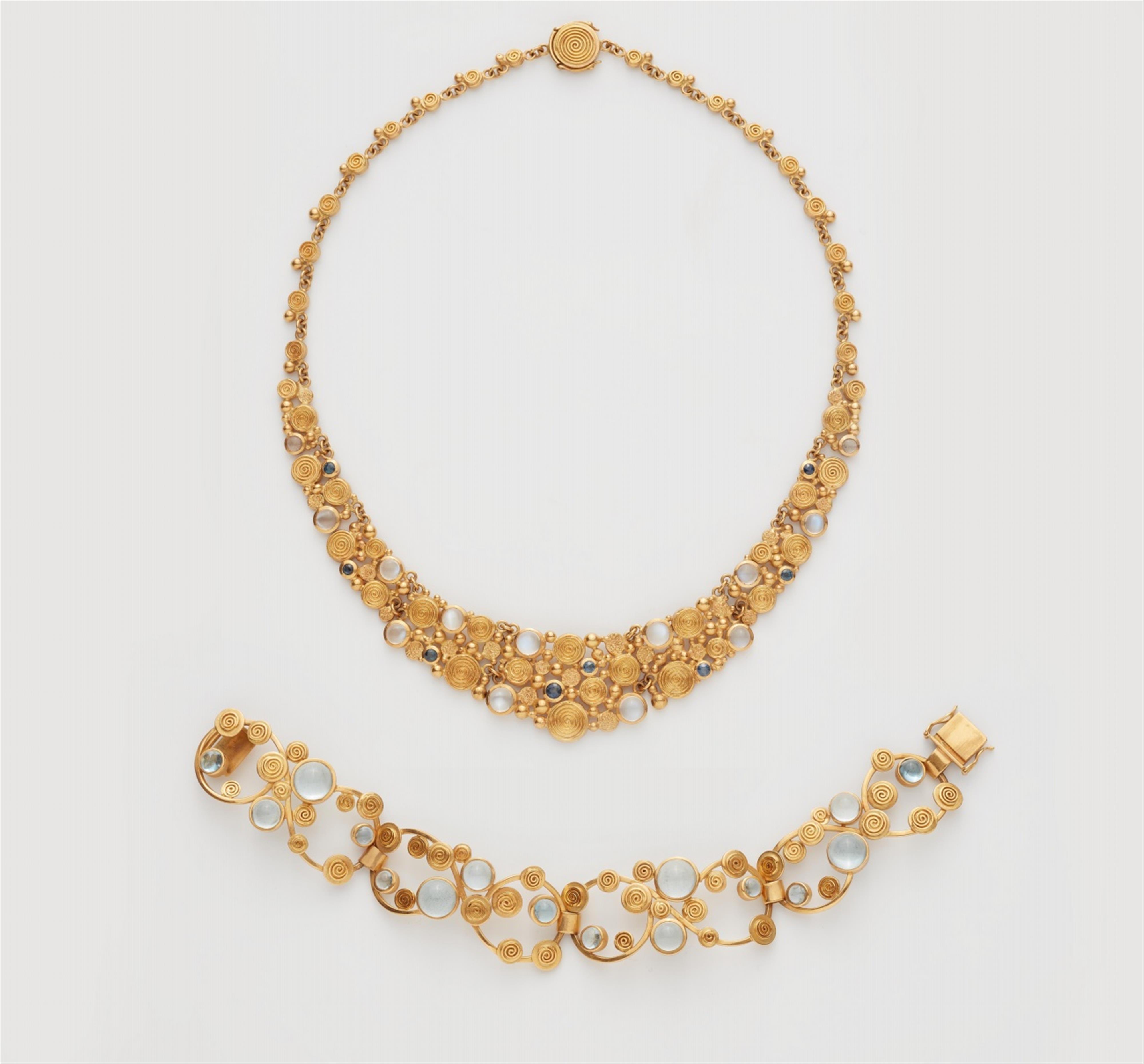 An 18k gold moonstone necklace and bracelet - image-1