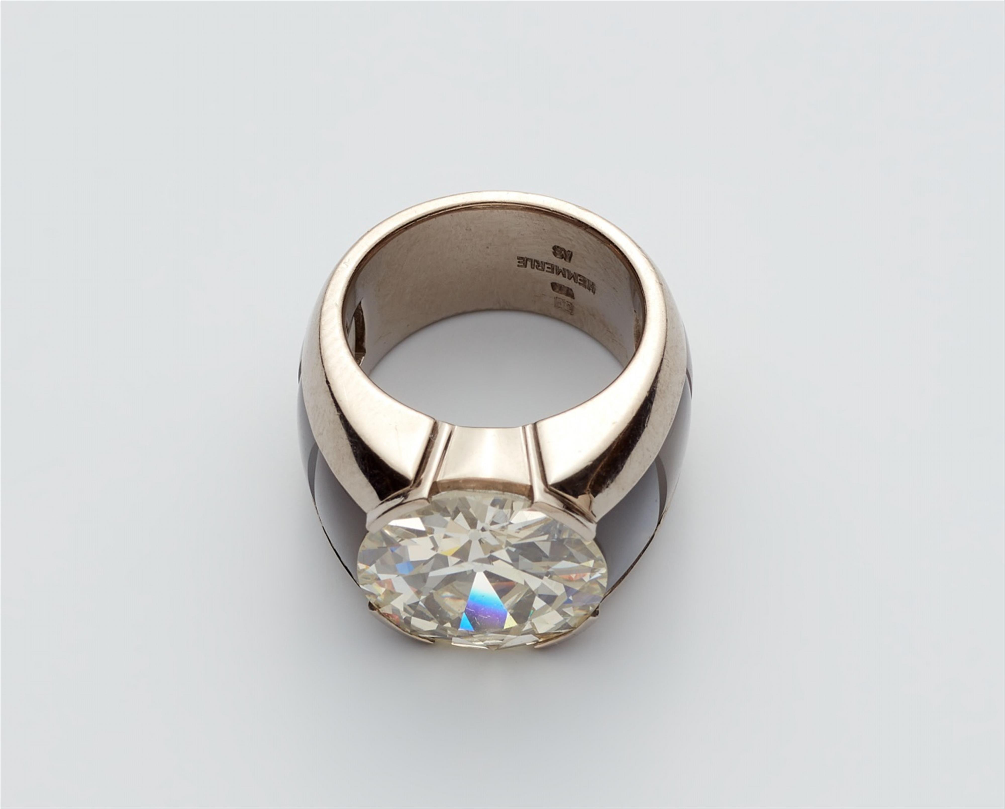 An 18k gold moonstone and diamond solitaire ring - image-5