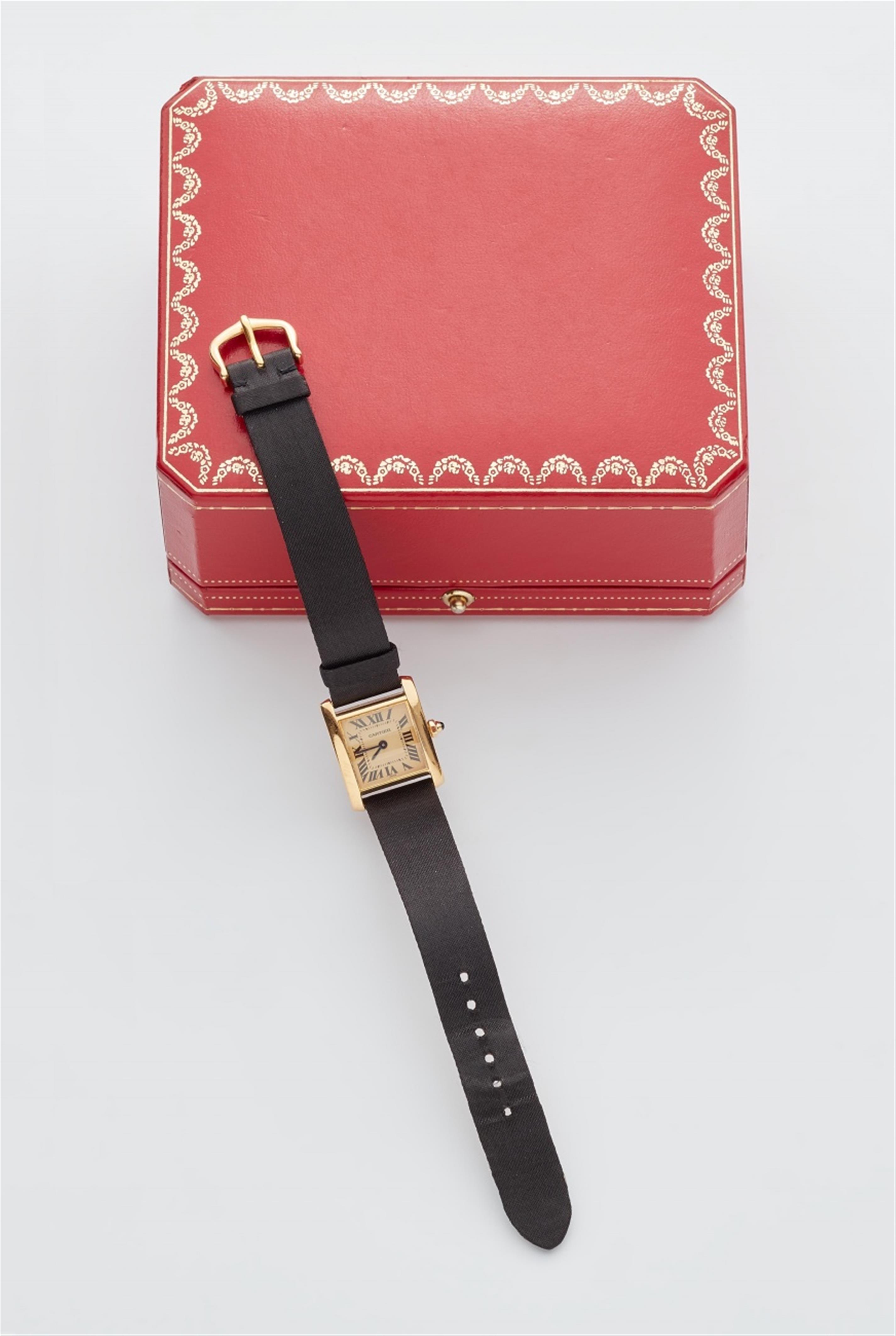 An 18k gold Cartier "Tank Francaise" ladies wristwatch - image-1