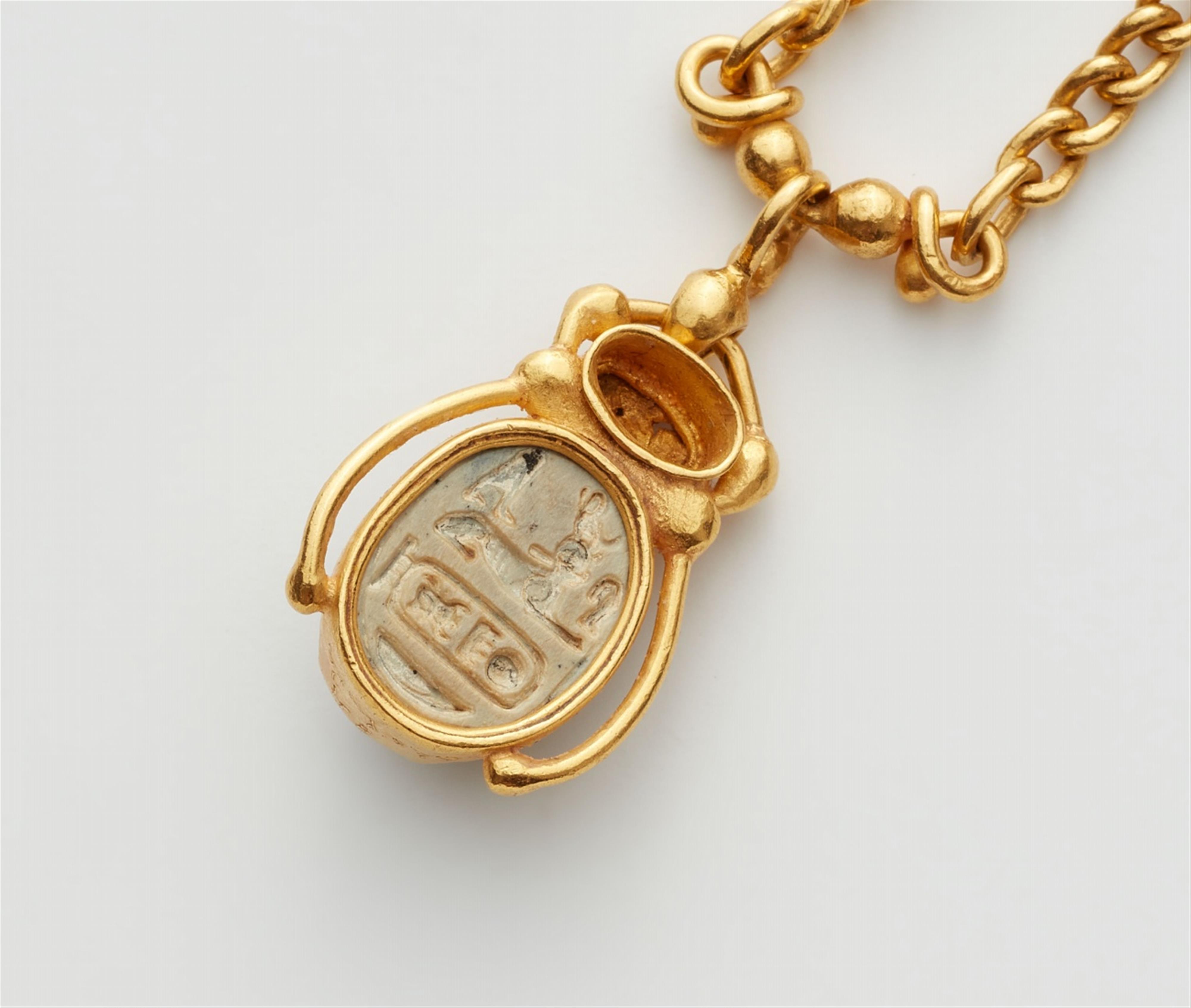 A scarab amulet necklace - image-3
