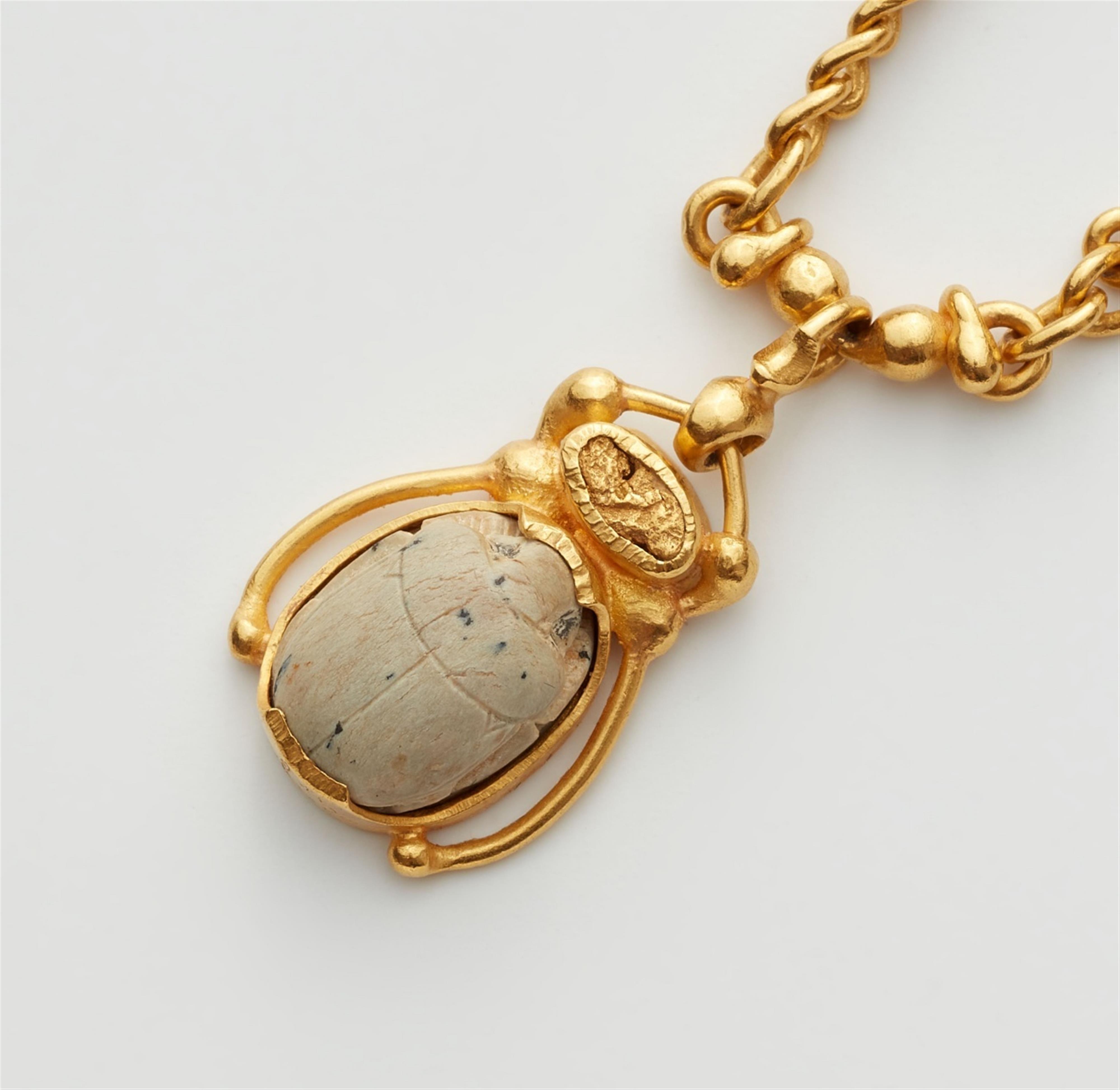 A scarab amulet necklace - image-1
