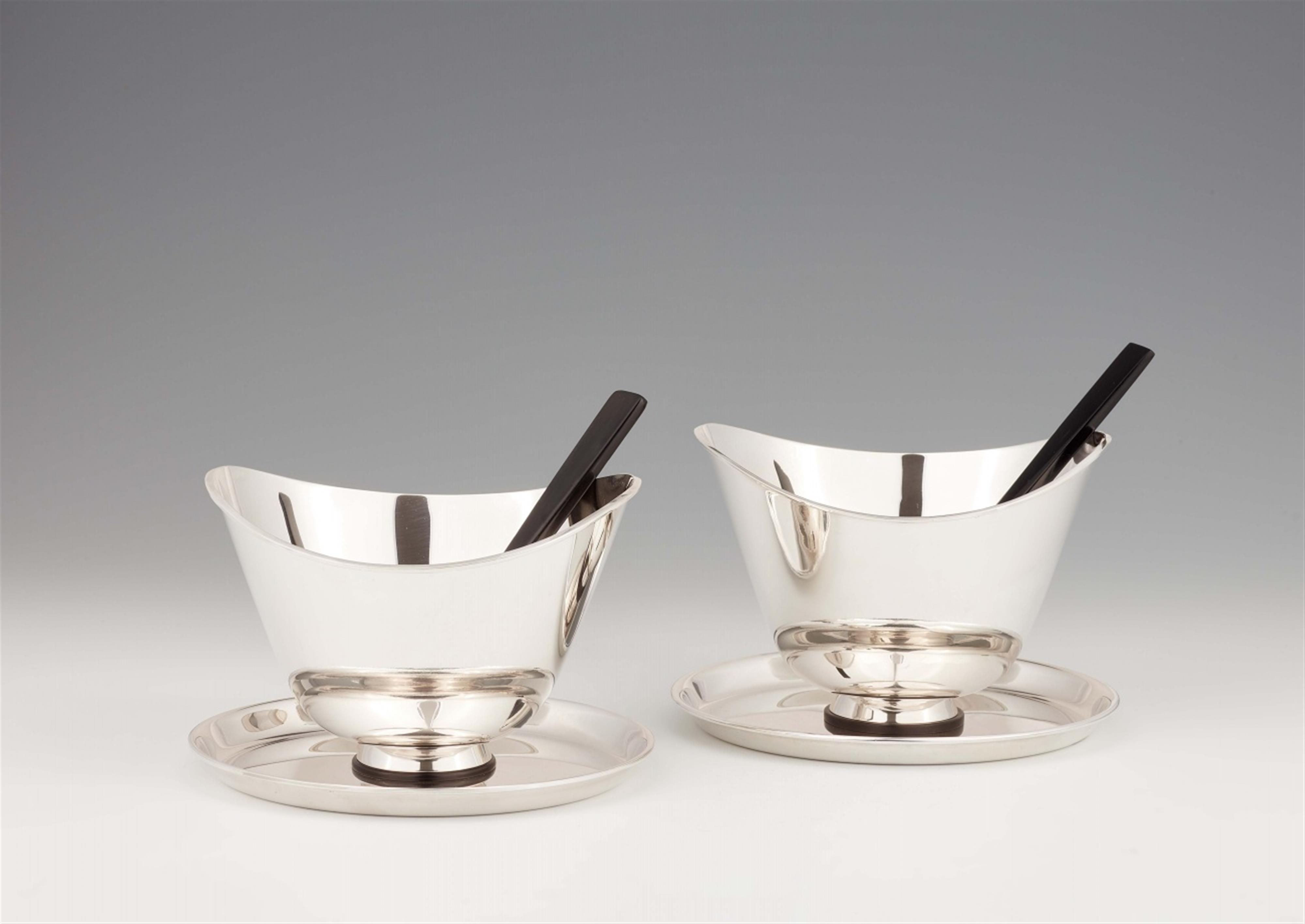 A pair of Copenhagen silver sauce boats and spoons - image-1