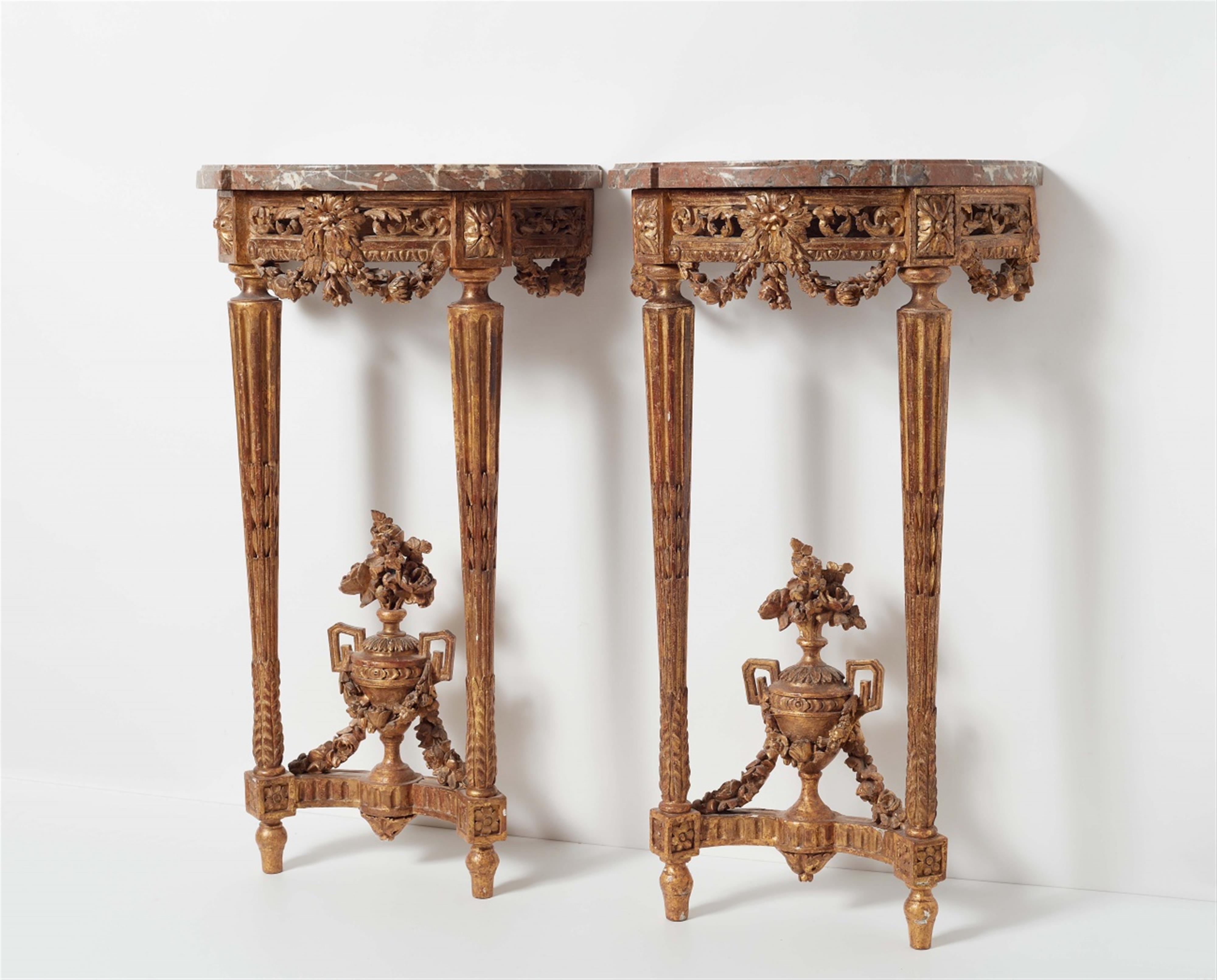 A pair of Parisian Louis XVI giltwood demi-lune console tables - image-1