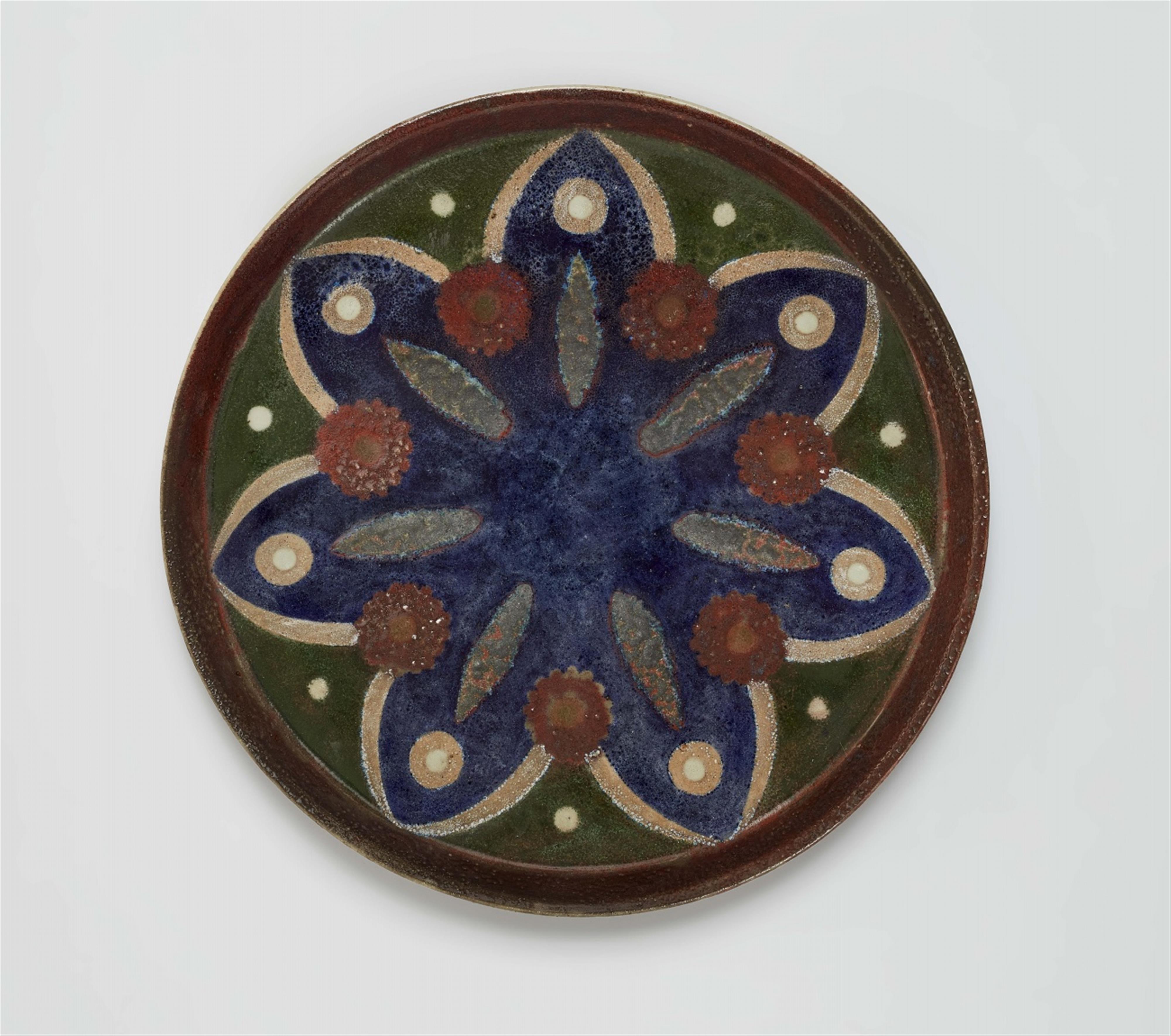 A salt glazed stoneware platter by Fernand Rumèbe - image-1
