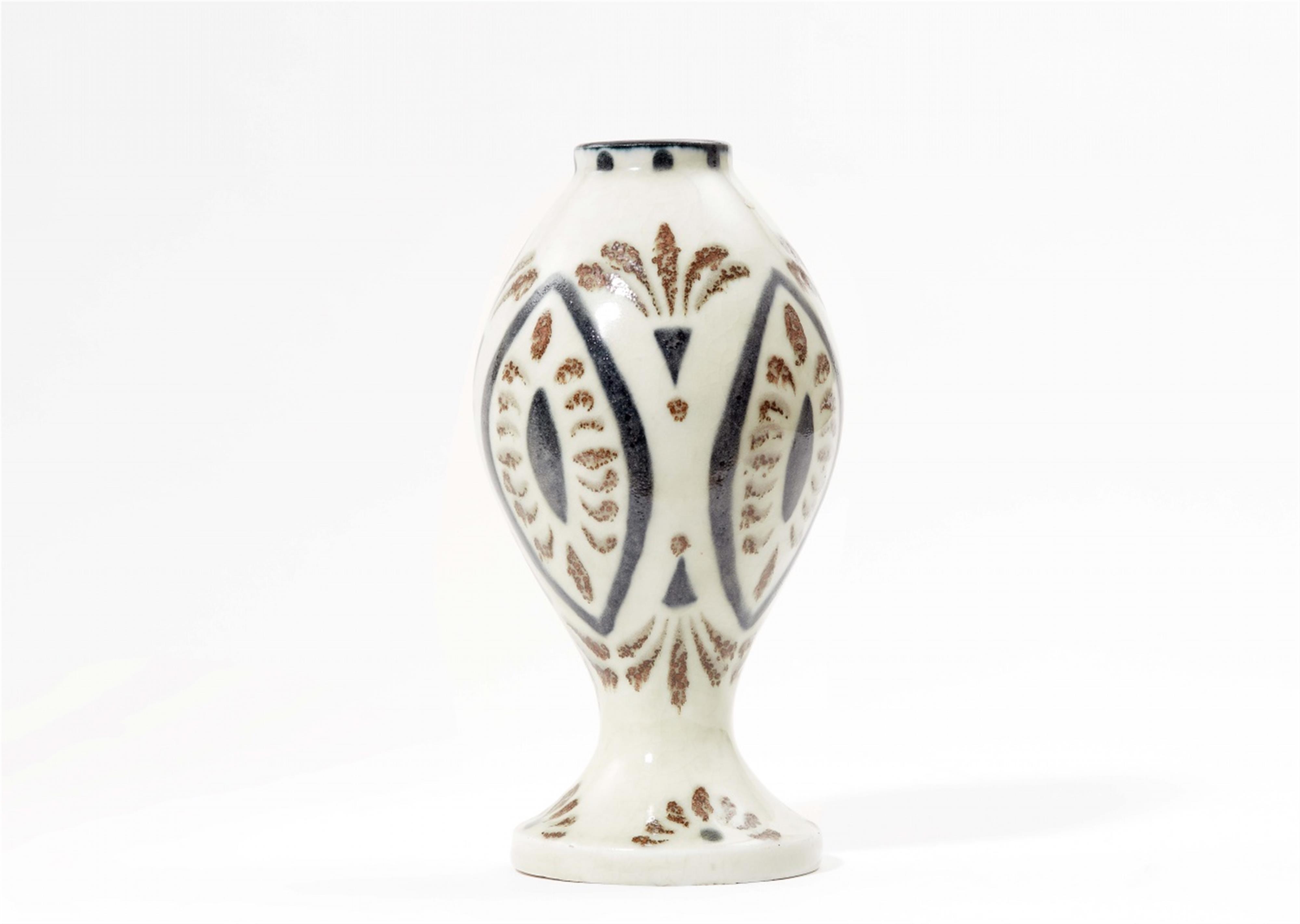 A stoneware vase by Fernand Rumèbe - image-1