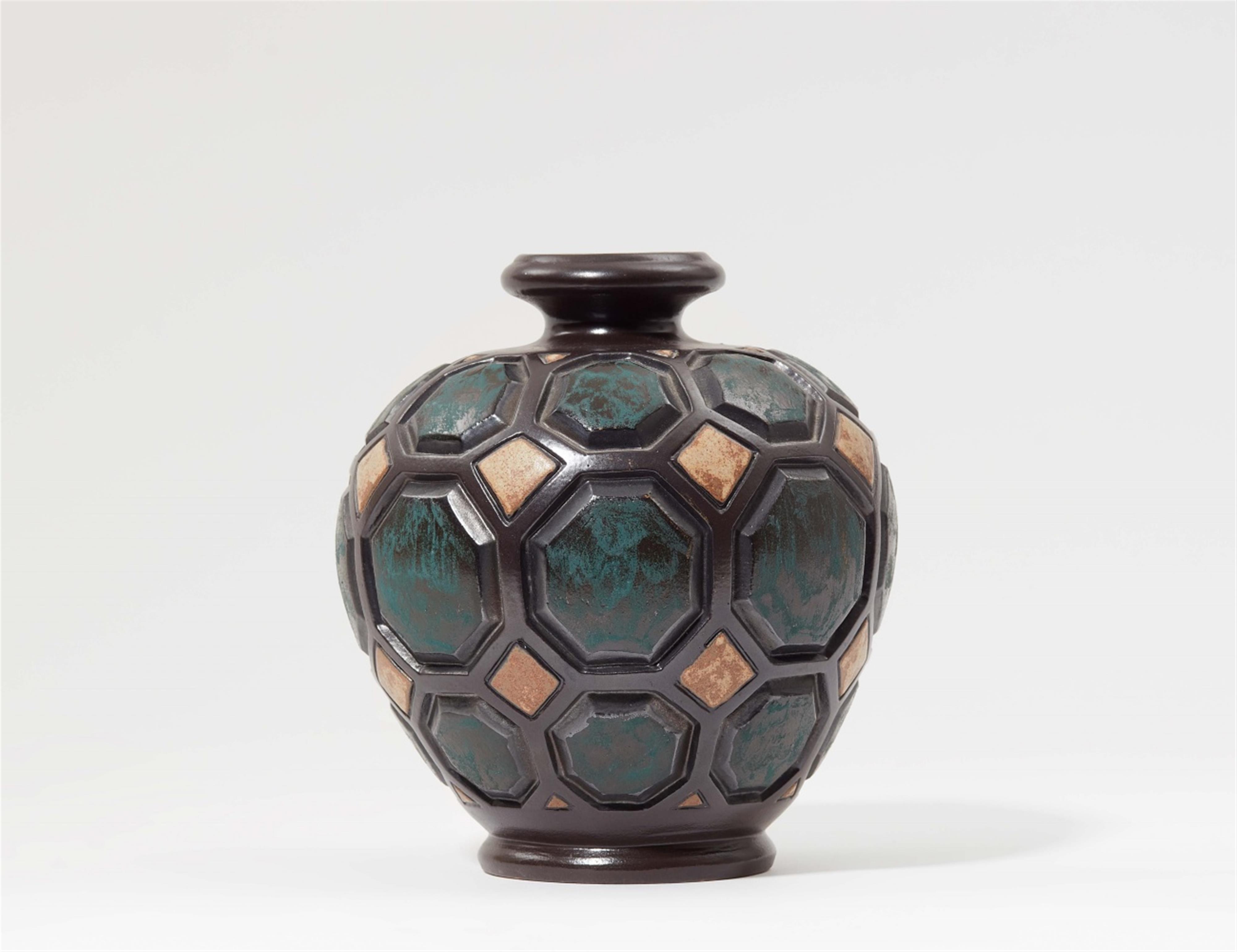 A stoneware vase with beehive decor - image-1