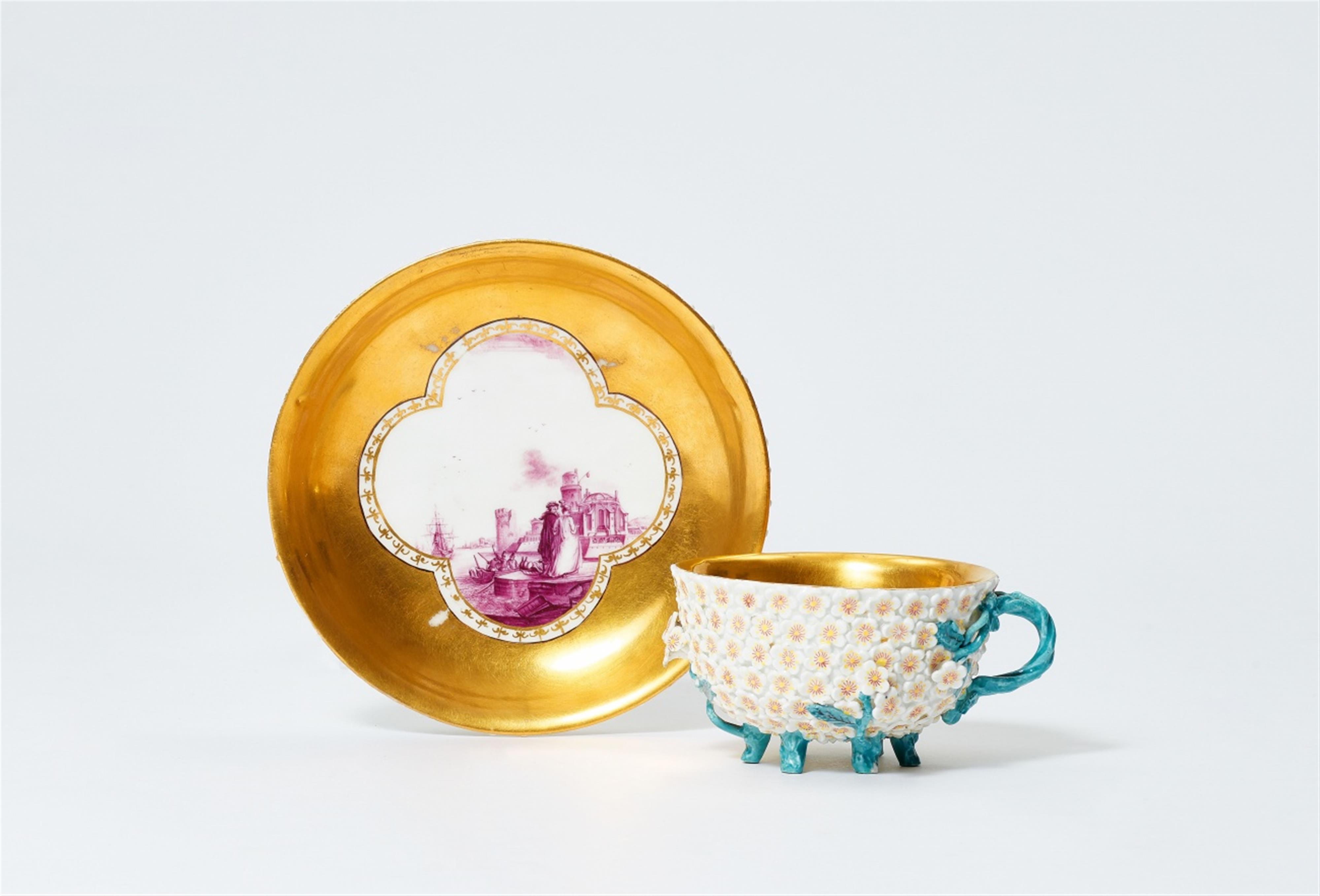 A Meissen porcelain cup and saucer with snowball flower relief - image-1