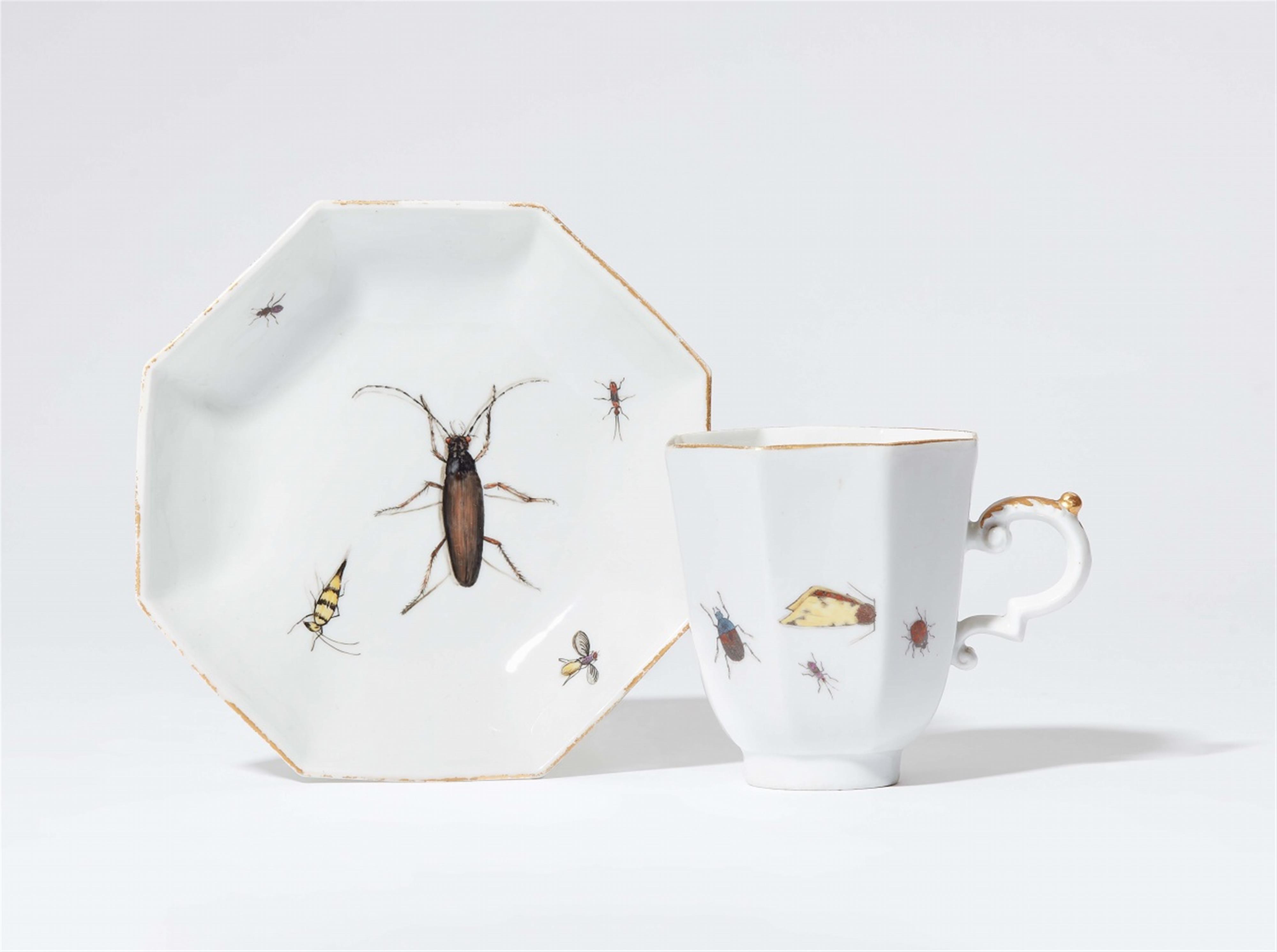 A Meissen porcelain cup and saucer with insect decor - image-1