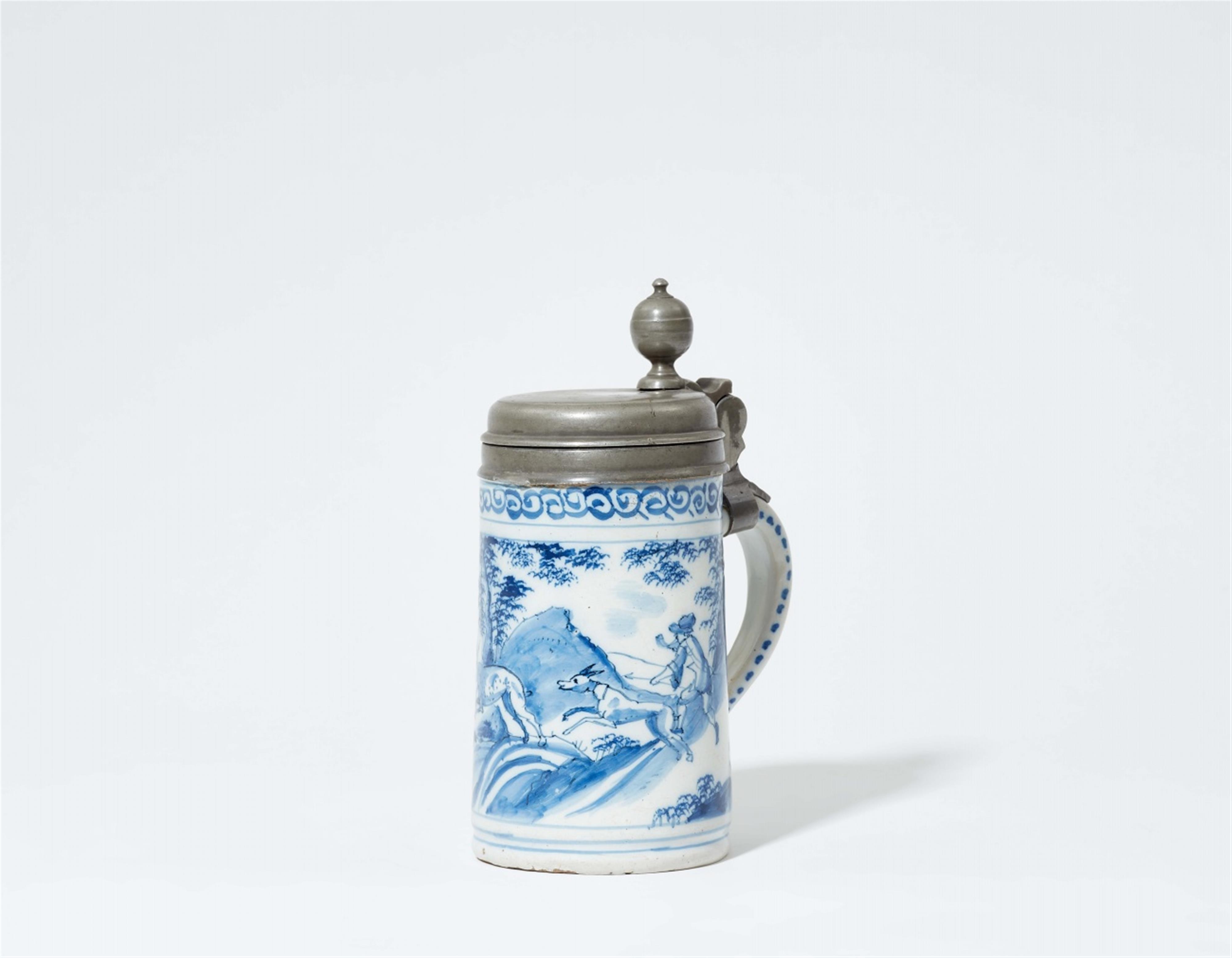 A pewter-mounted faience tankard with a hunting scene - image-1