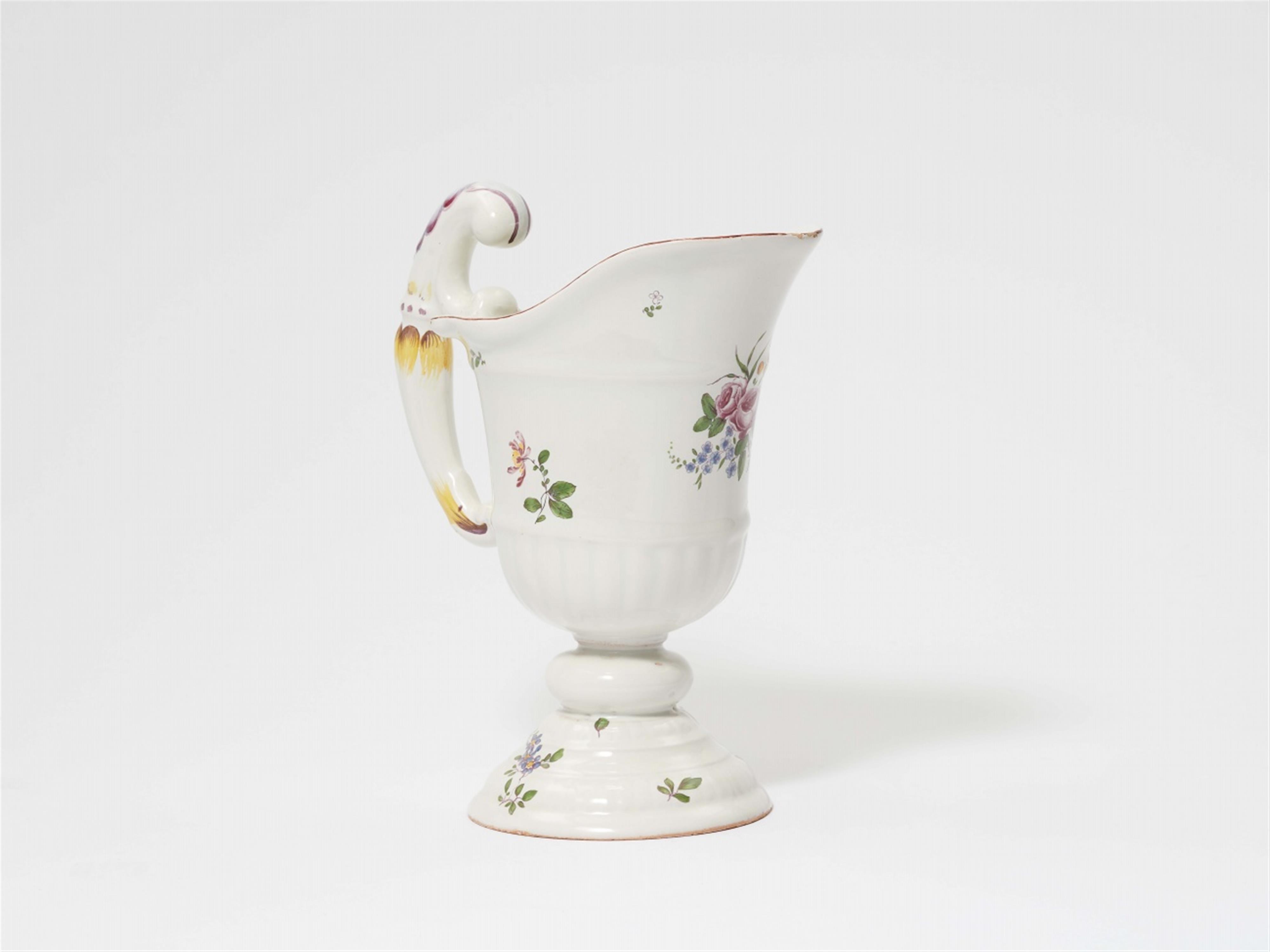 A Strasbourg faience pitcher with floral decor - image-1