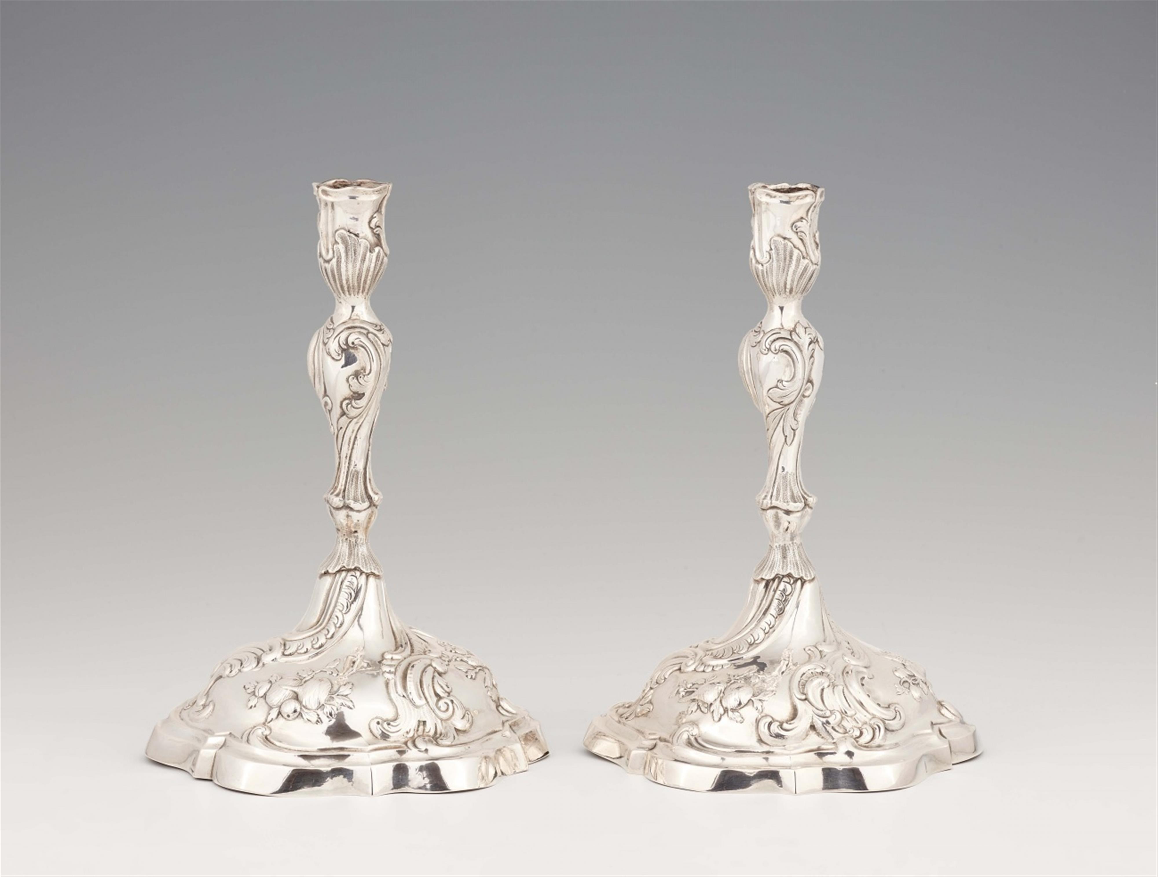 A pair of Rococo silver candlesticks - image-1