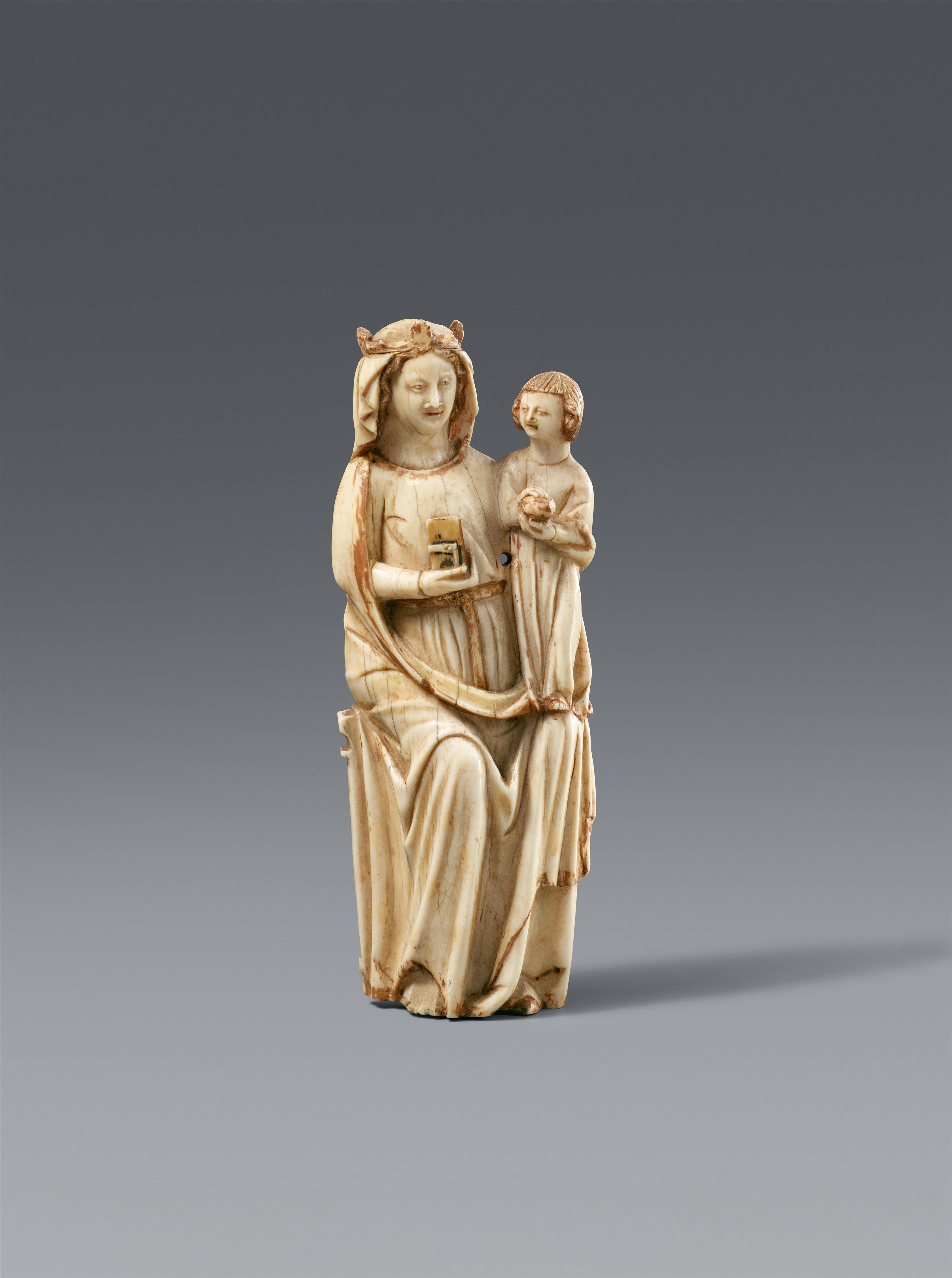 France second half 14th century - A French carved ivory figure of the Virgin enthroned, second half 14th century - image-1