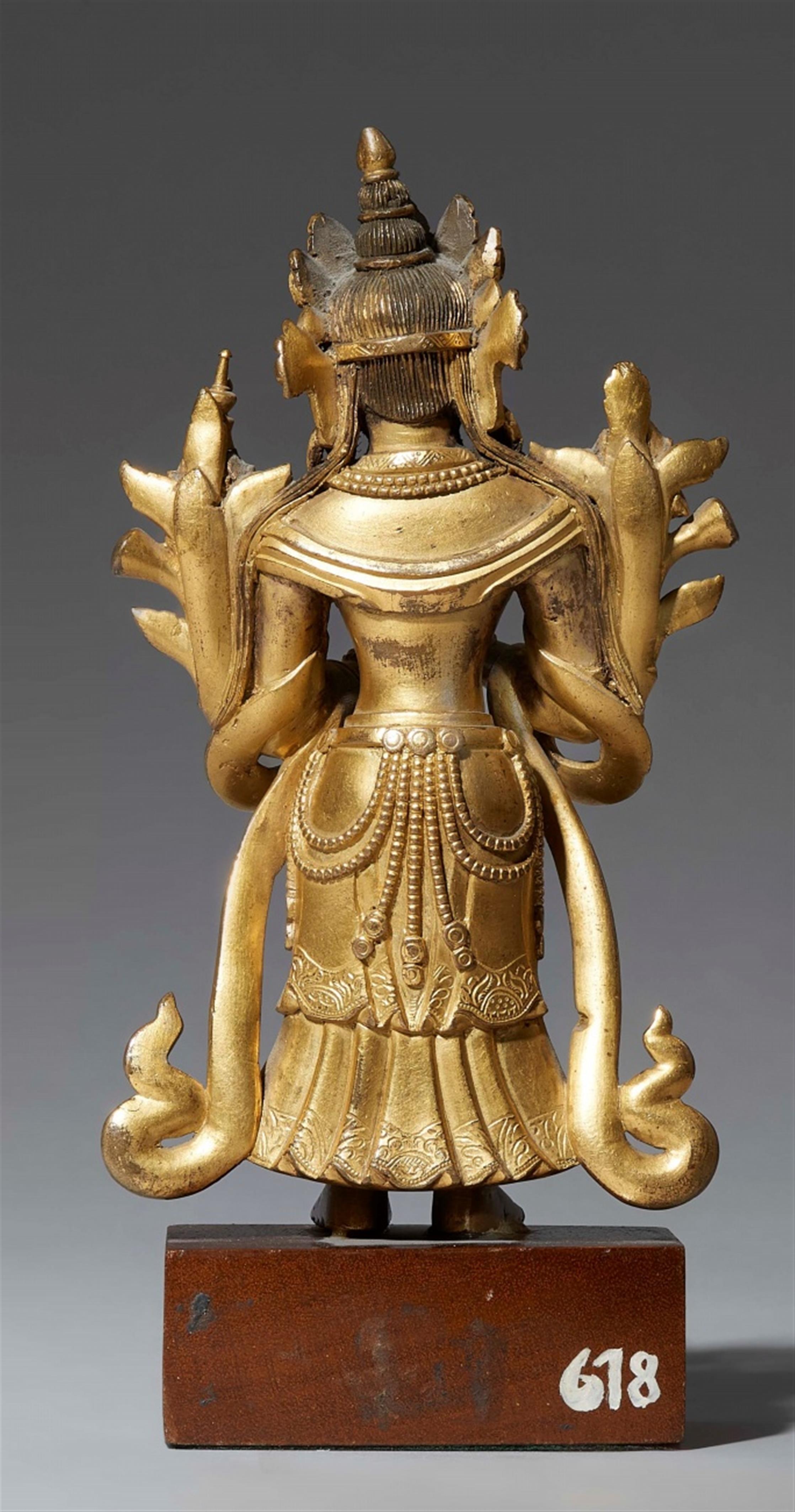 A Tibetochinese gilt bronze figure of Maitreya. 18th century - image-2