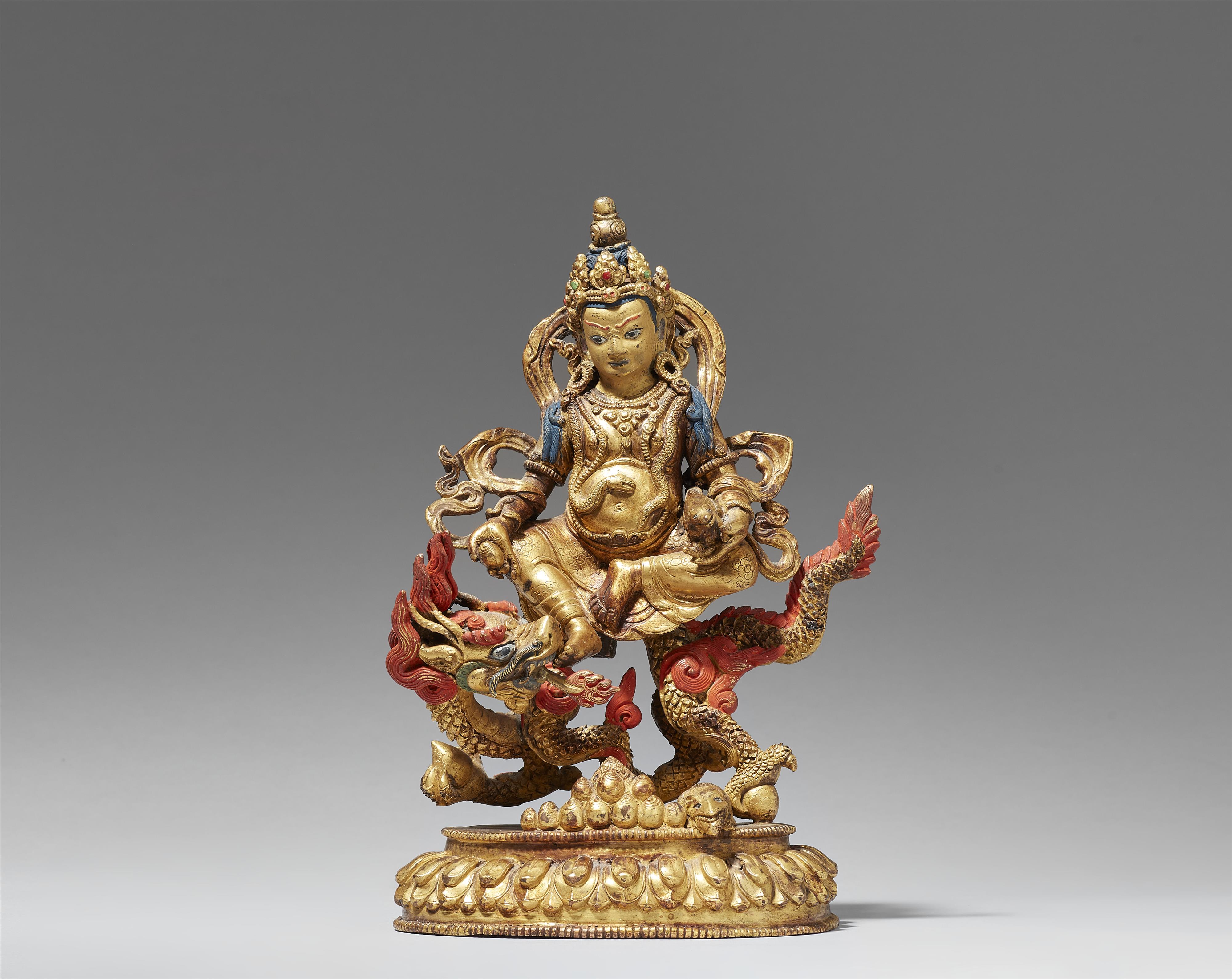 A Tibetochinese gilt bronze figure of Jambhala. Late 19th century - image-2