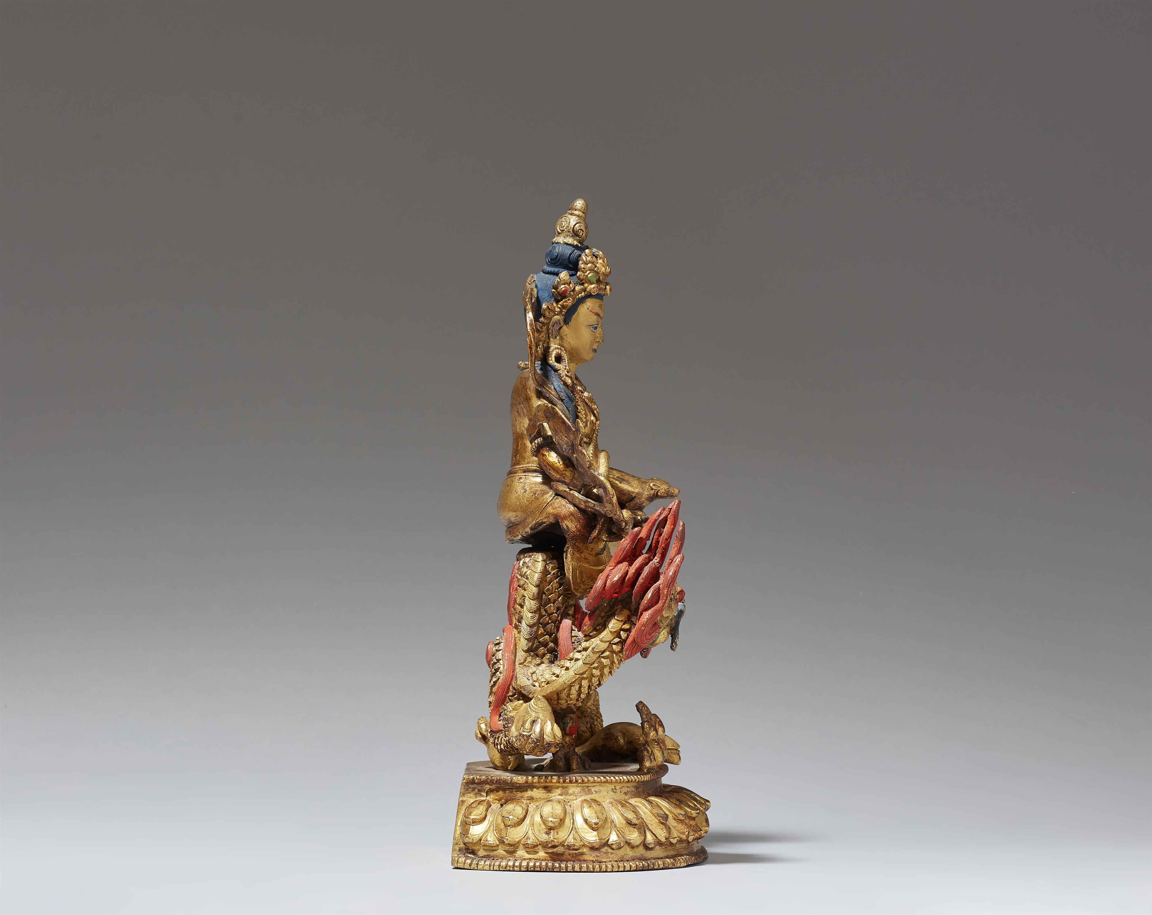 A Tibetochinese gilt bronze figure of Jambhala. Late 19th century - image-5