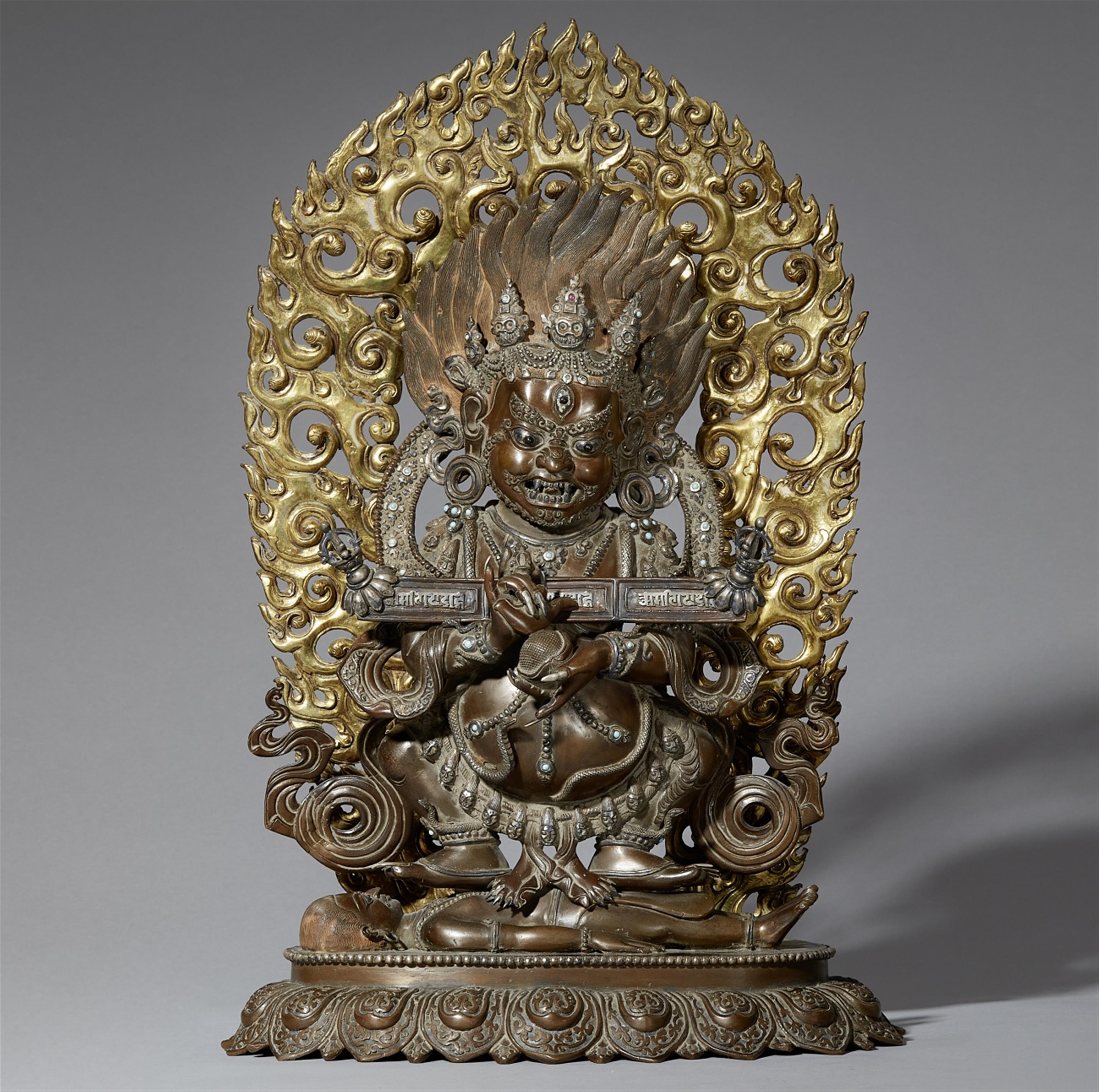 A Tibetan silver-inlaid dark bronze figure of Mahakala Panjarnata. 19th/20th century - image-1