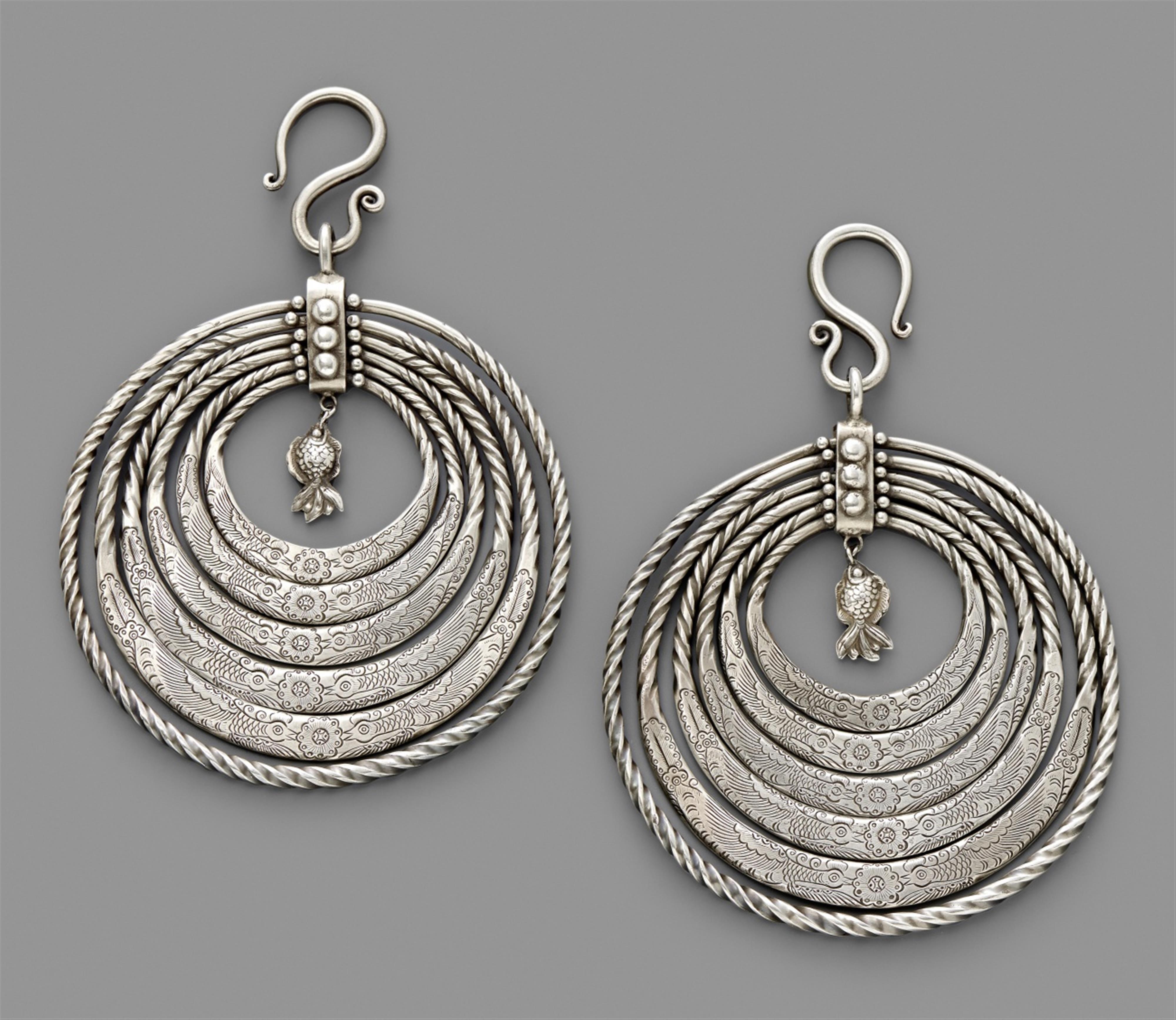 A pair of silver ear rings for women of the Li tribe. Southern China. Hainan island. 1950s/60s - image-1