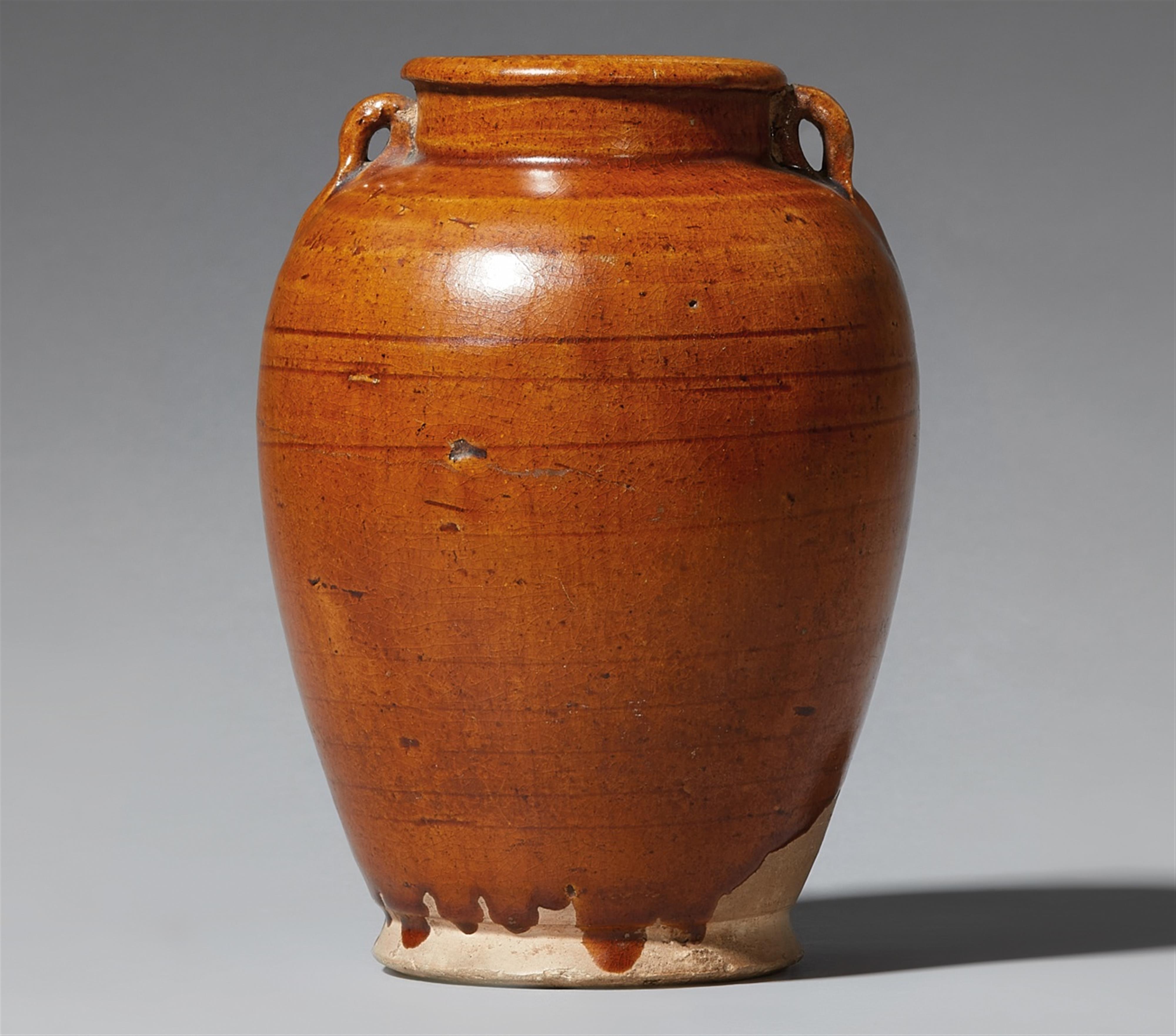 A small brown-glazed jar. Tang dynasty (618-907) - image-1