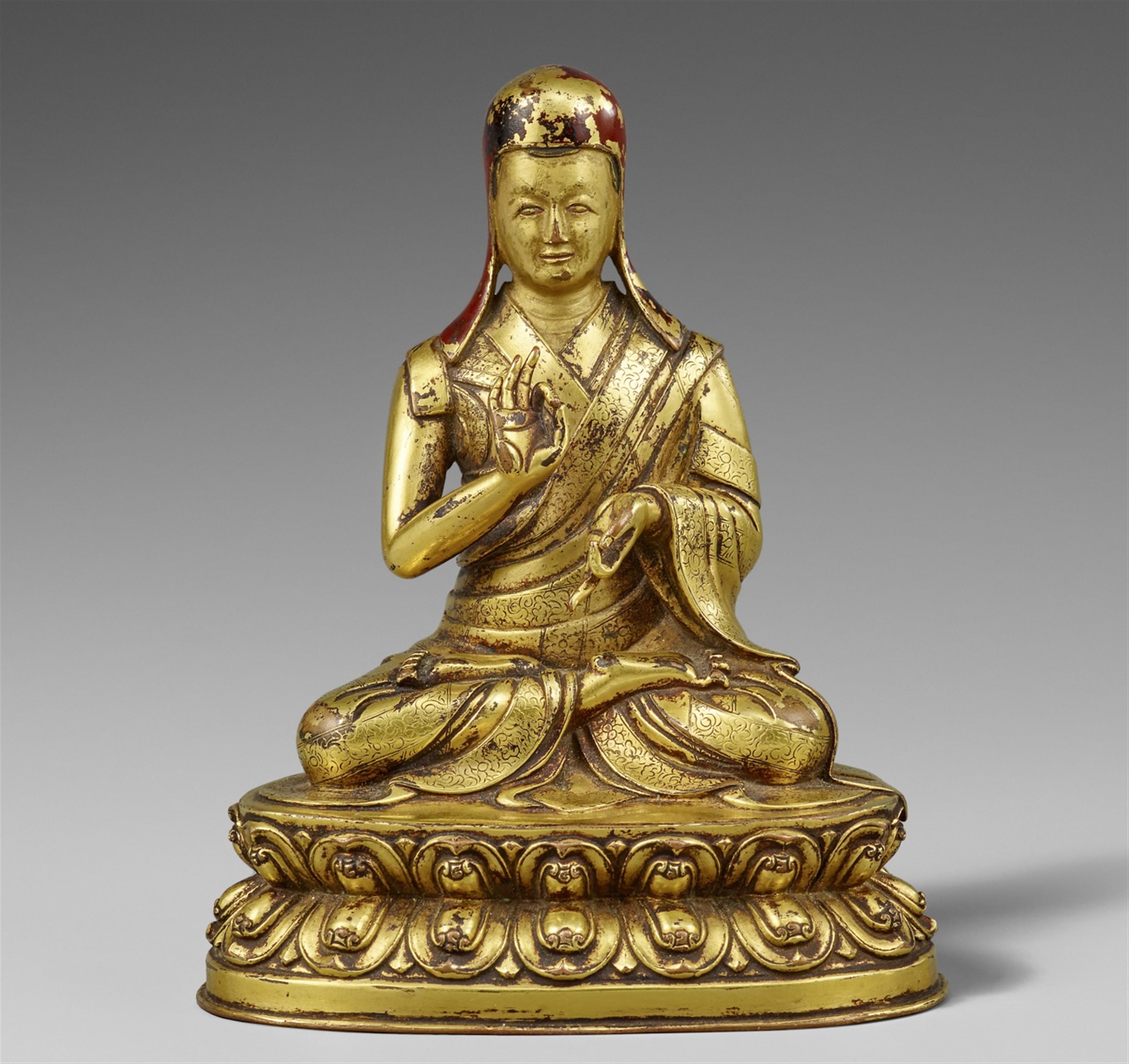 A fine Tibetan gilt bronze figure of a Sakya patriarch, possibly Sakya Pandita (1182-1251). 15th/16th century - image-1