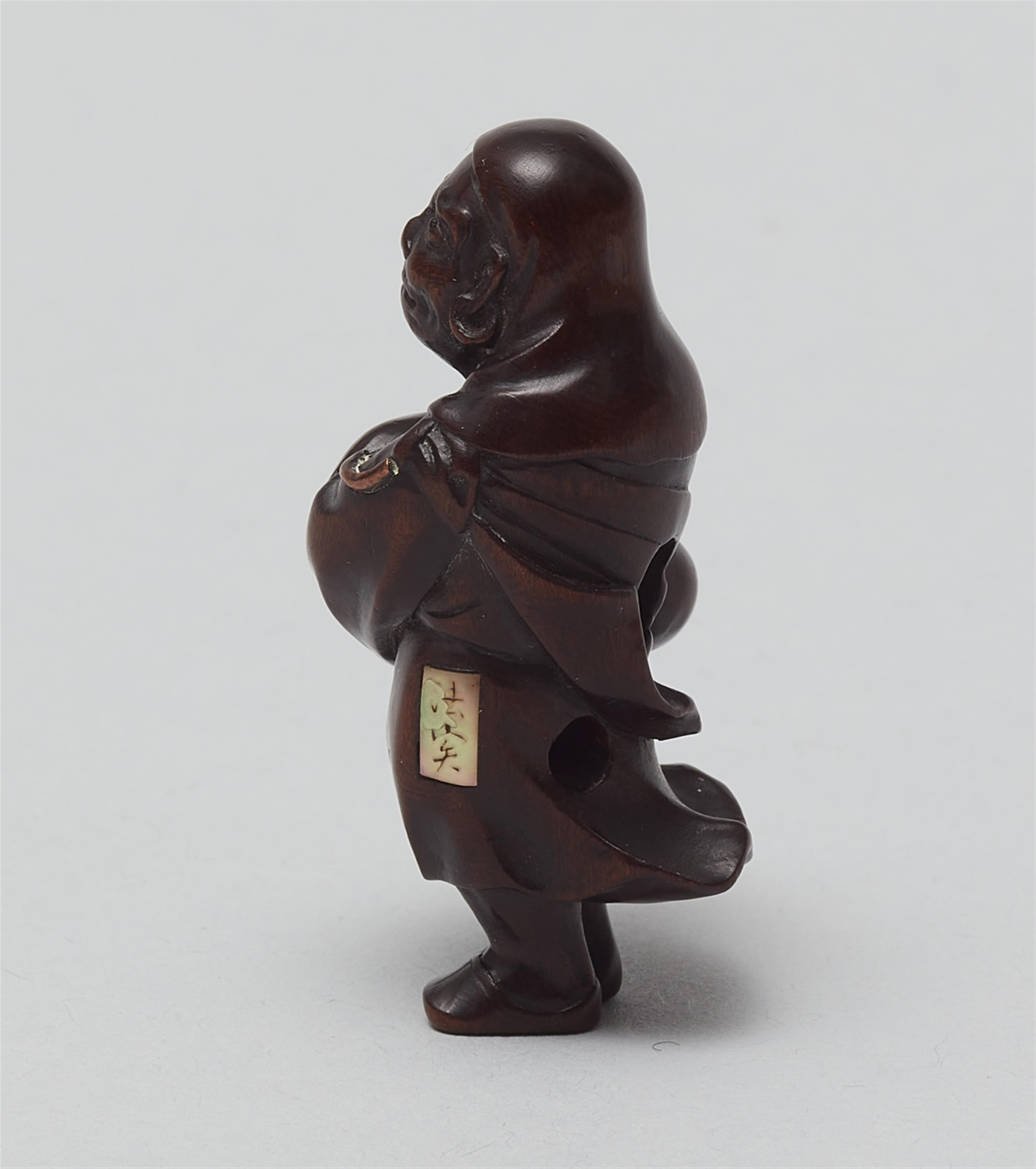 A finely carved netsuke of Daruma. Mid-19th century - image-2