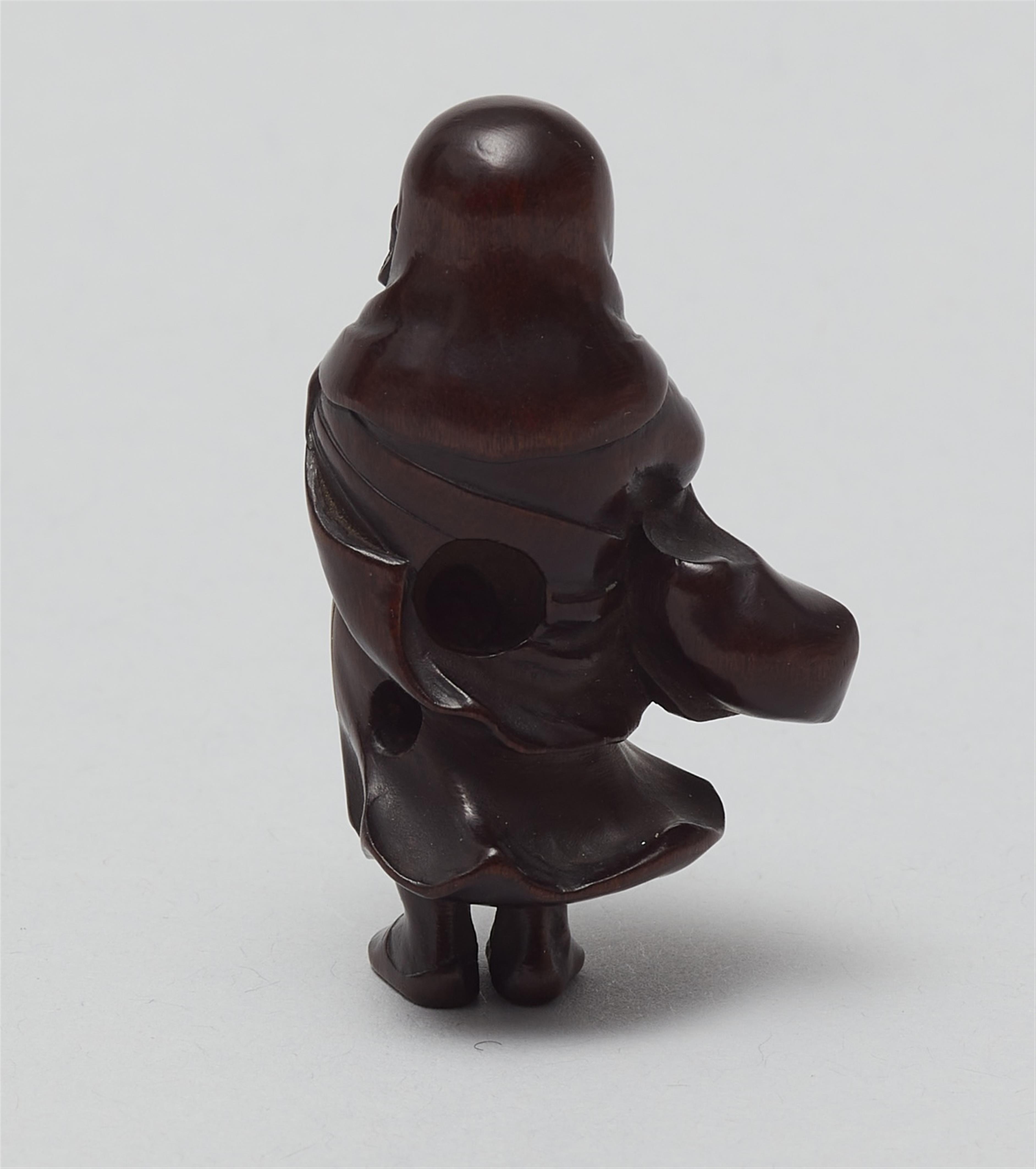A finely carved netsuke of Daruma. Mid-19th century - image-3