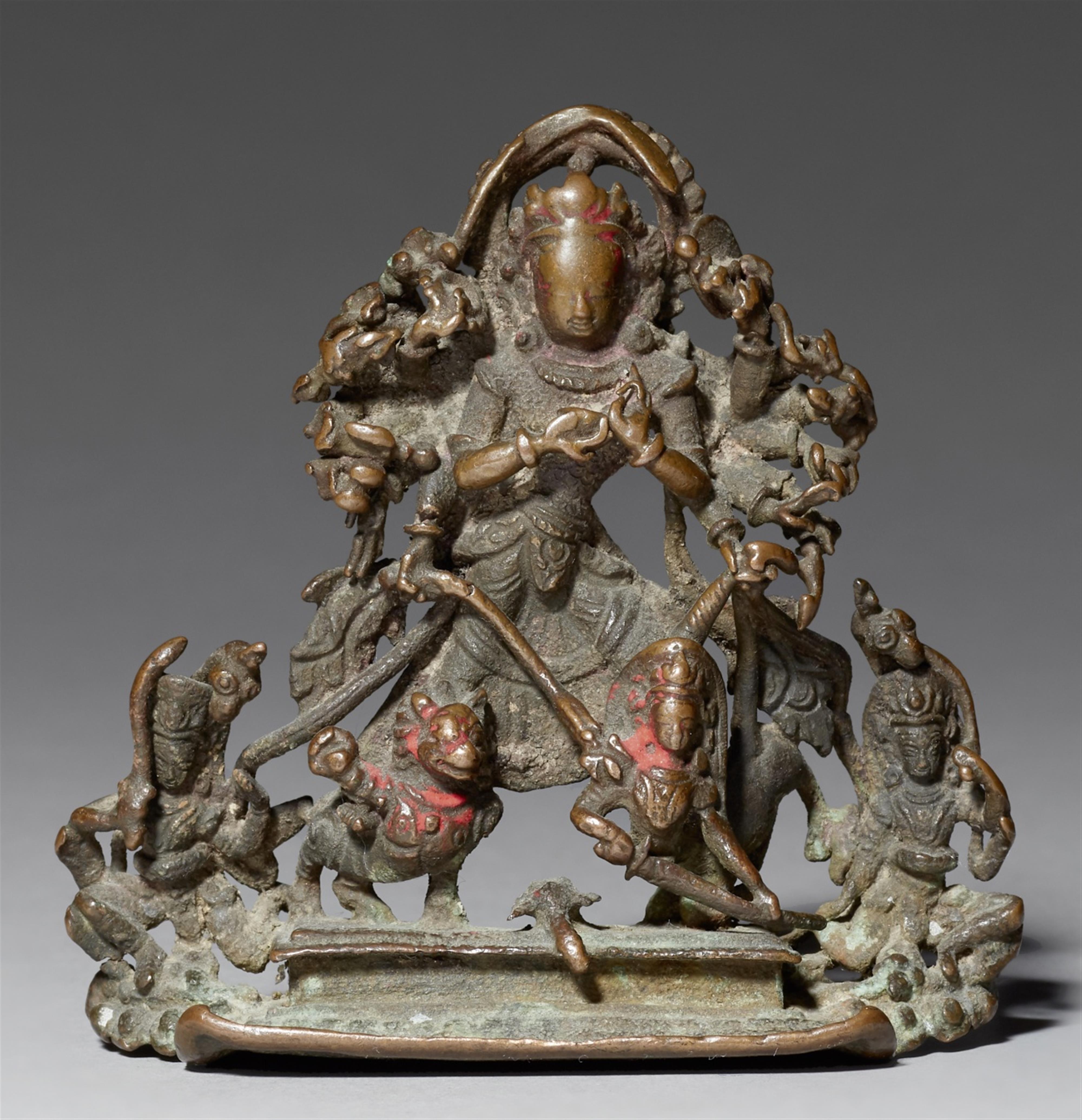 A Nepalese bronze figure of Durga slaying the demon Mahishasura. 12th century - image-1