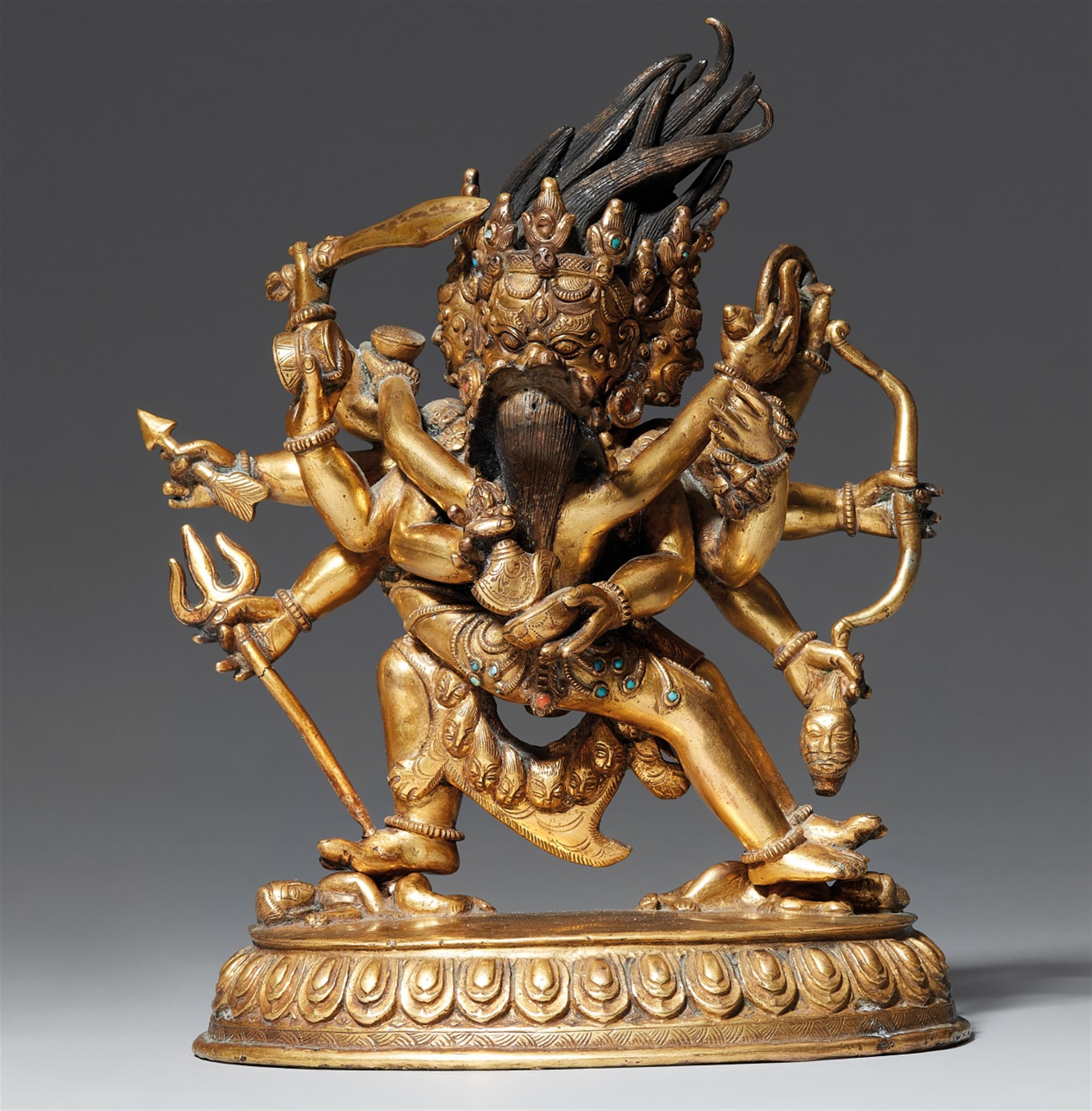 A Tibetochinese gilt bronze figure of Mahakala with his consort in yab-yum. 18th/19th century - image-1