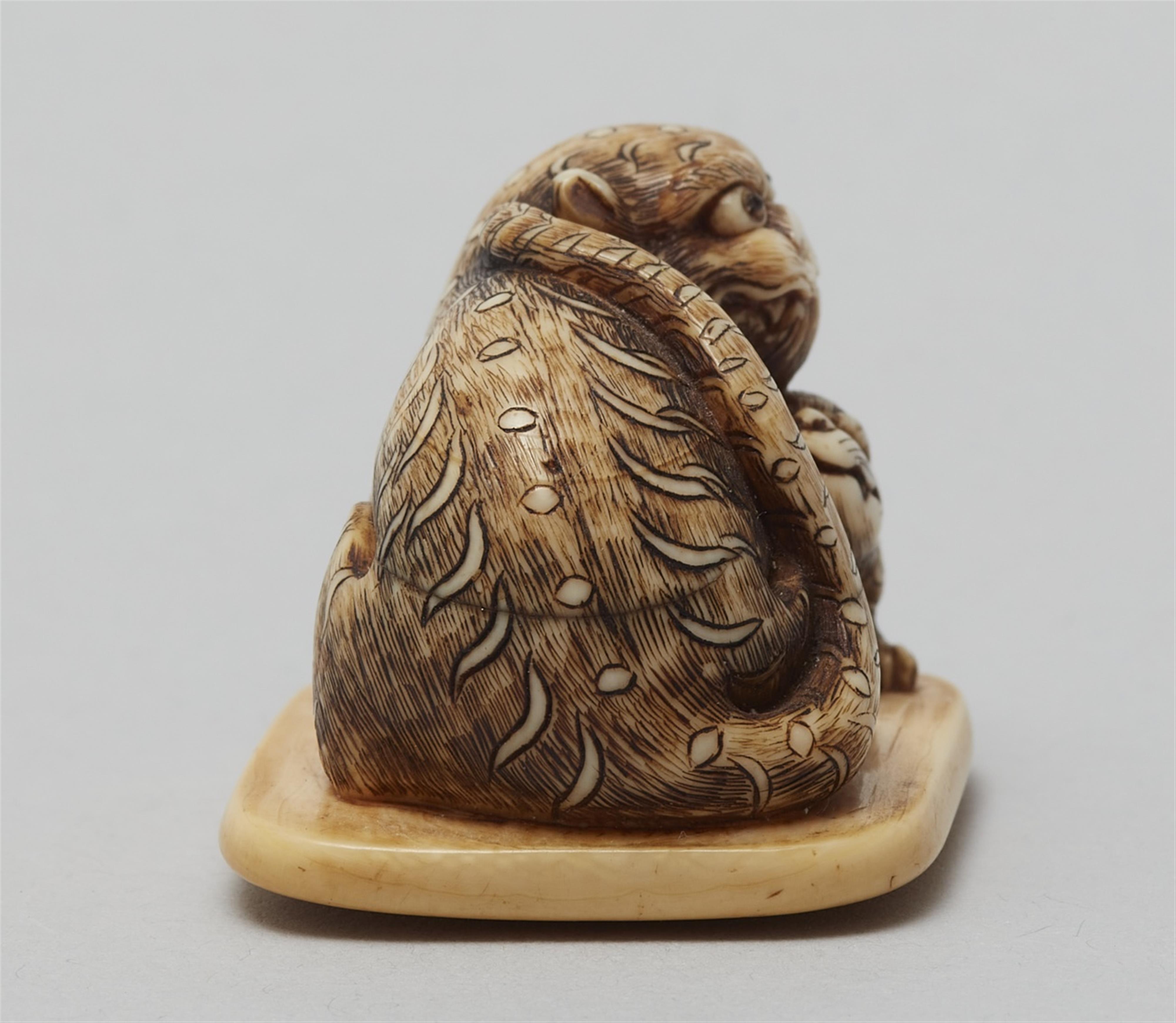 An ivory netsuke of a tiger and cub. Mid-19th century - image-4