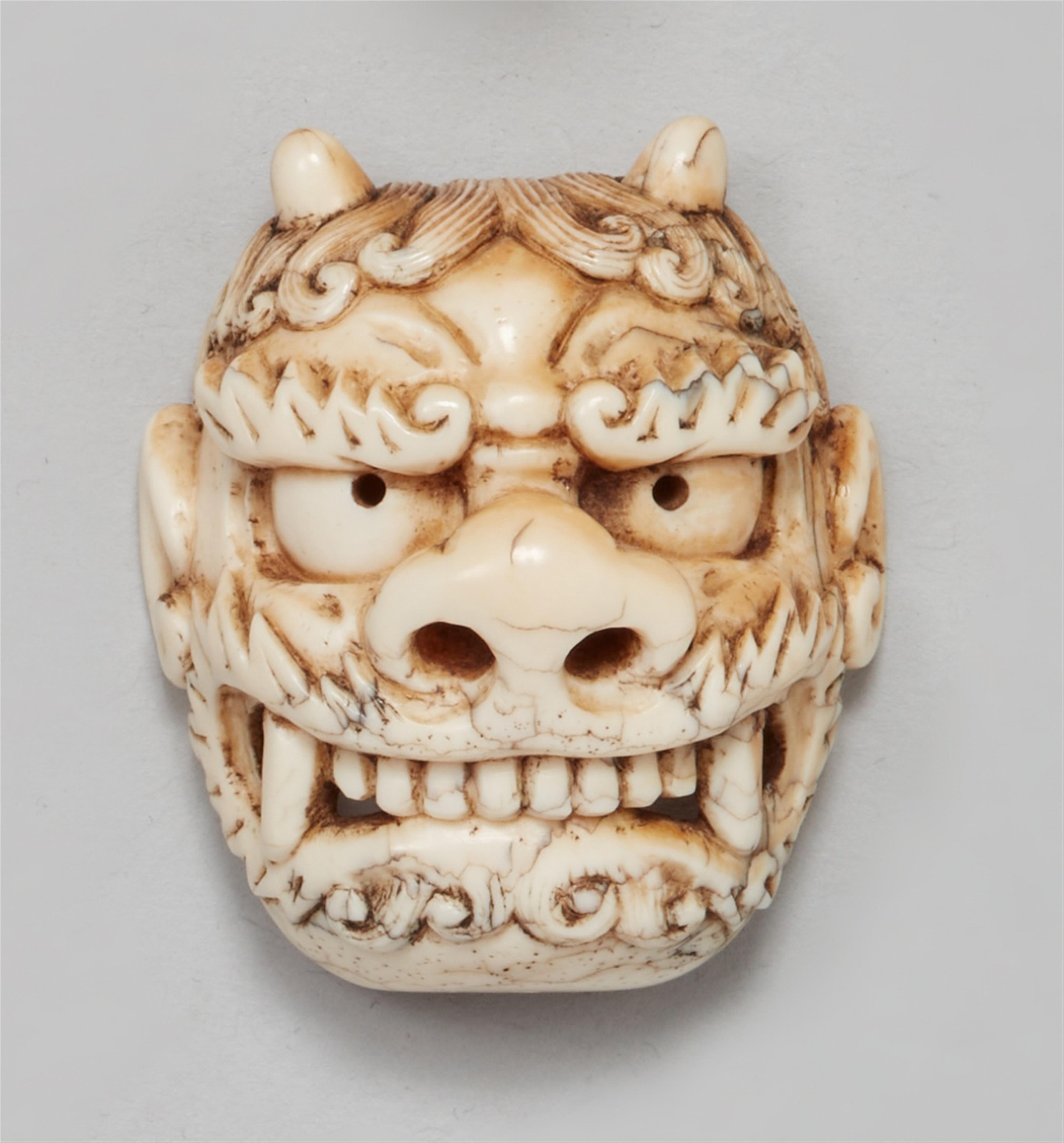 An ivory netsuke of an oni mask. Second half 19th century - image-1