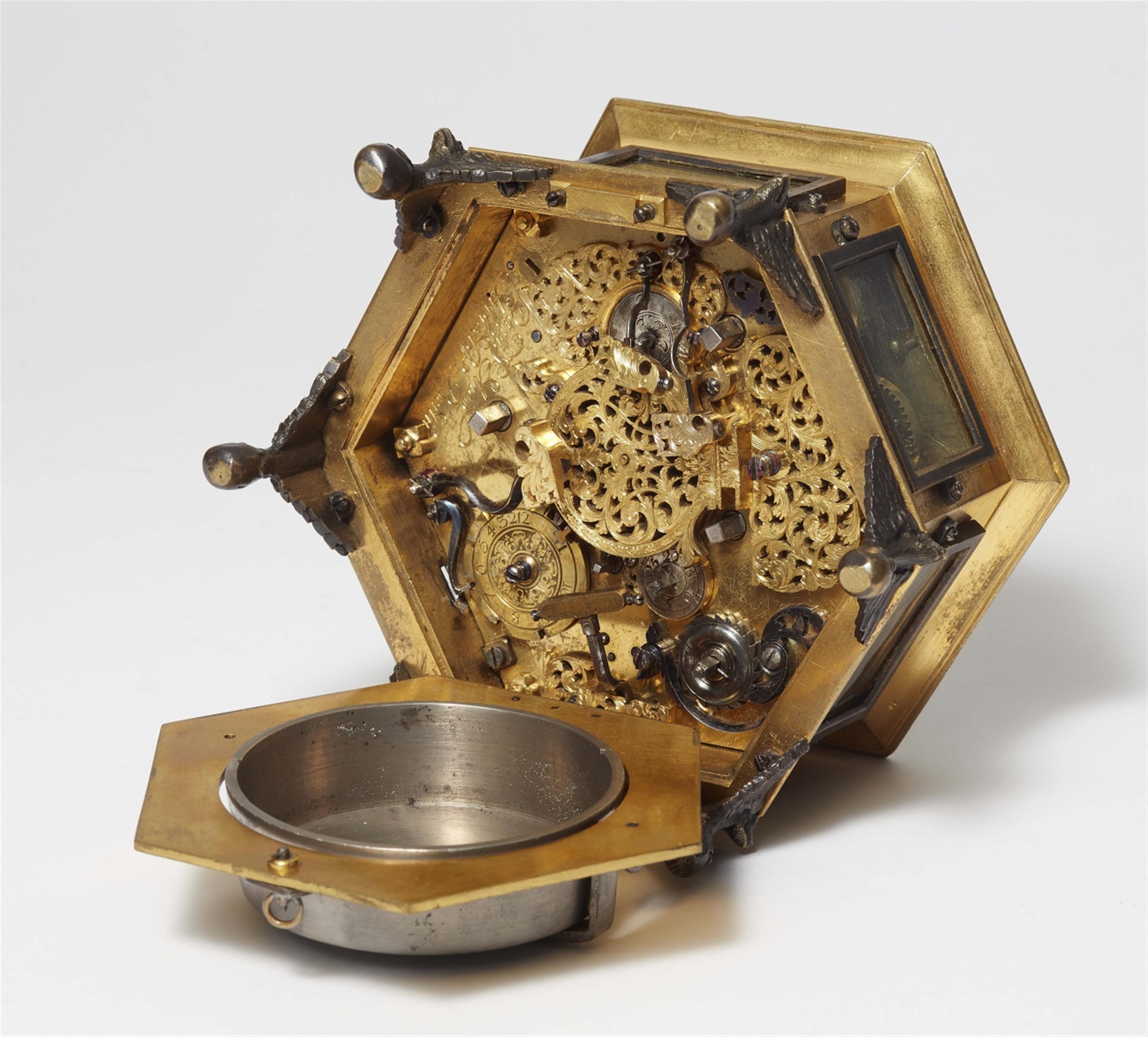 A rare octagonal bronze table clock - image-2