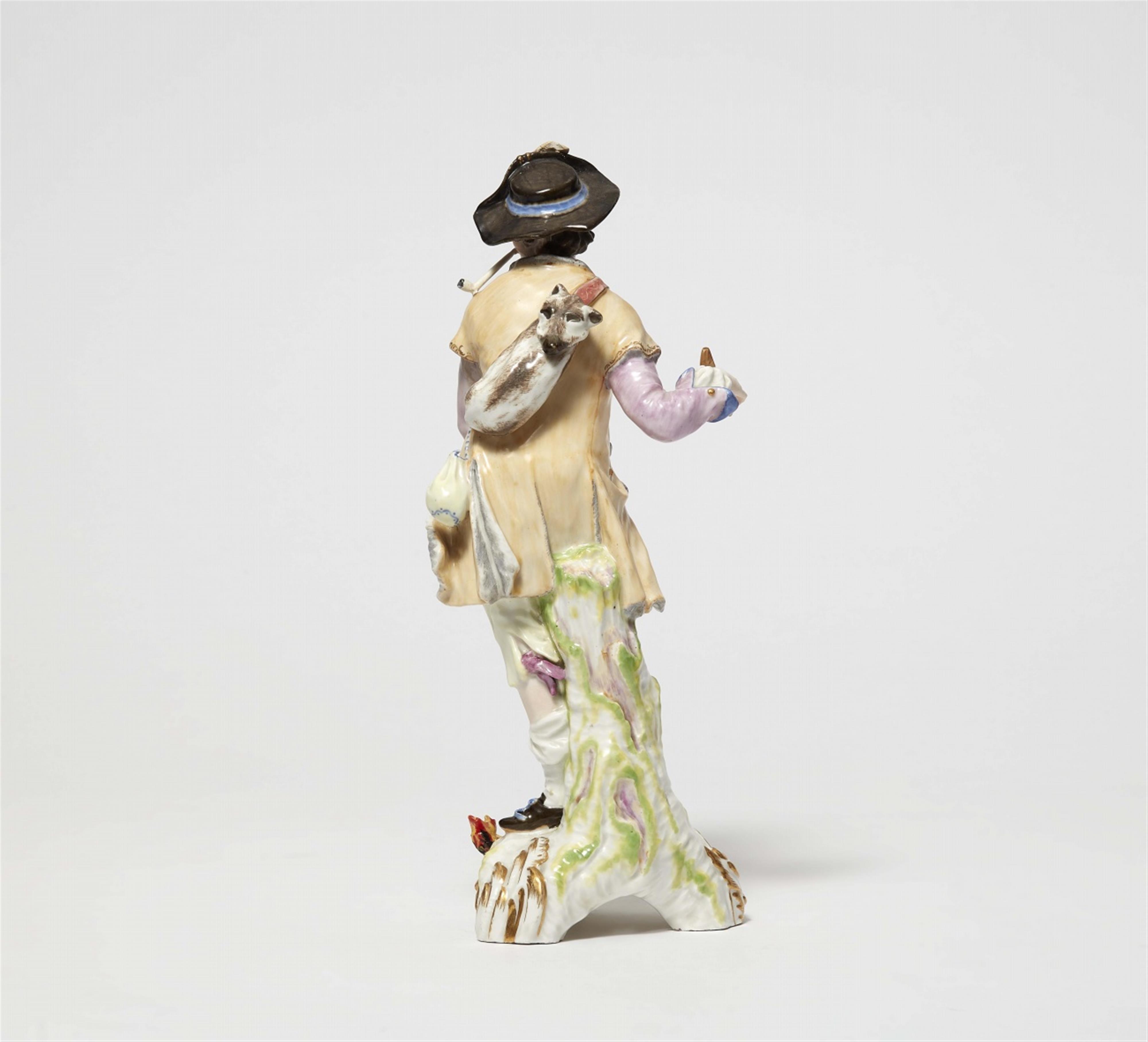 A Berlin KPM porcelain model of a shepherd with a pipe as an allegory of fire - image-2
