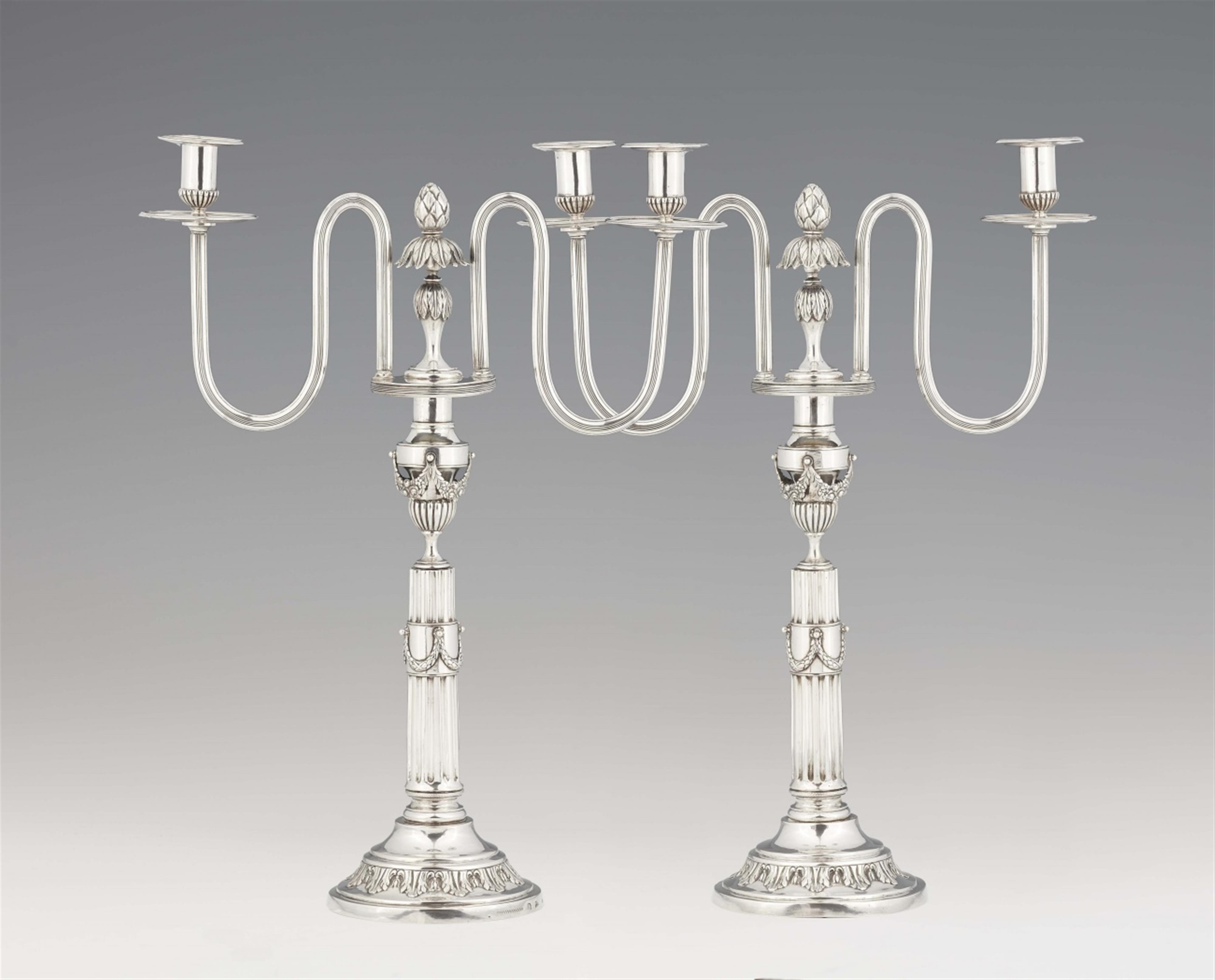 A pair of Berlin silver Louis XVI two flame candelabra - image-1