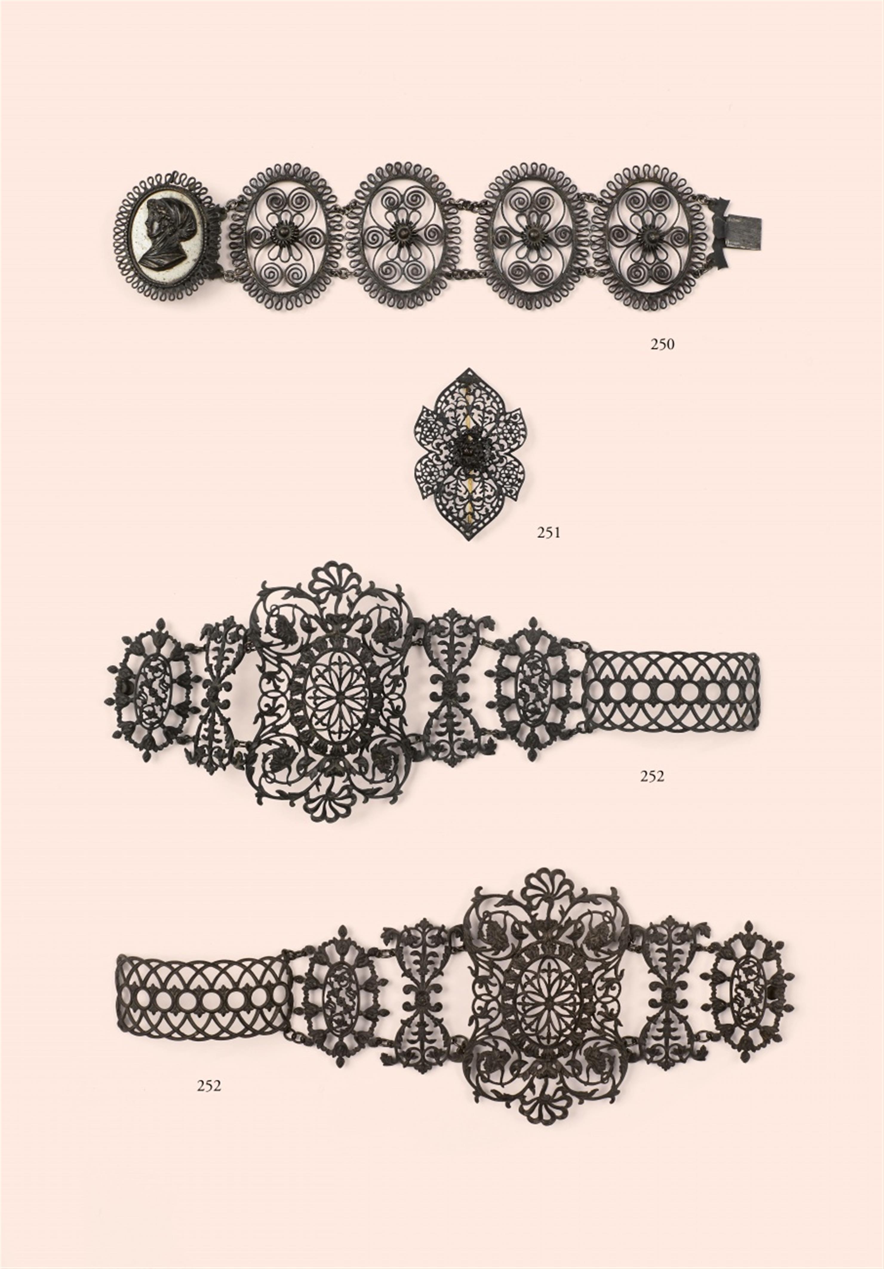 A floral cast iron brooch - image-1