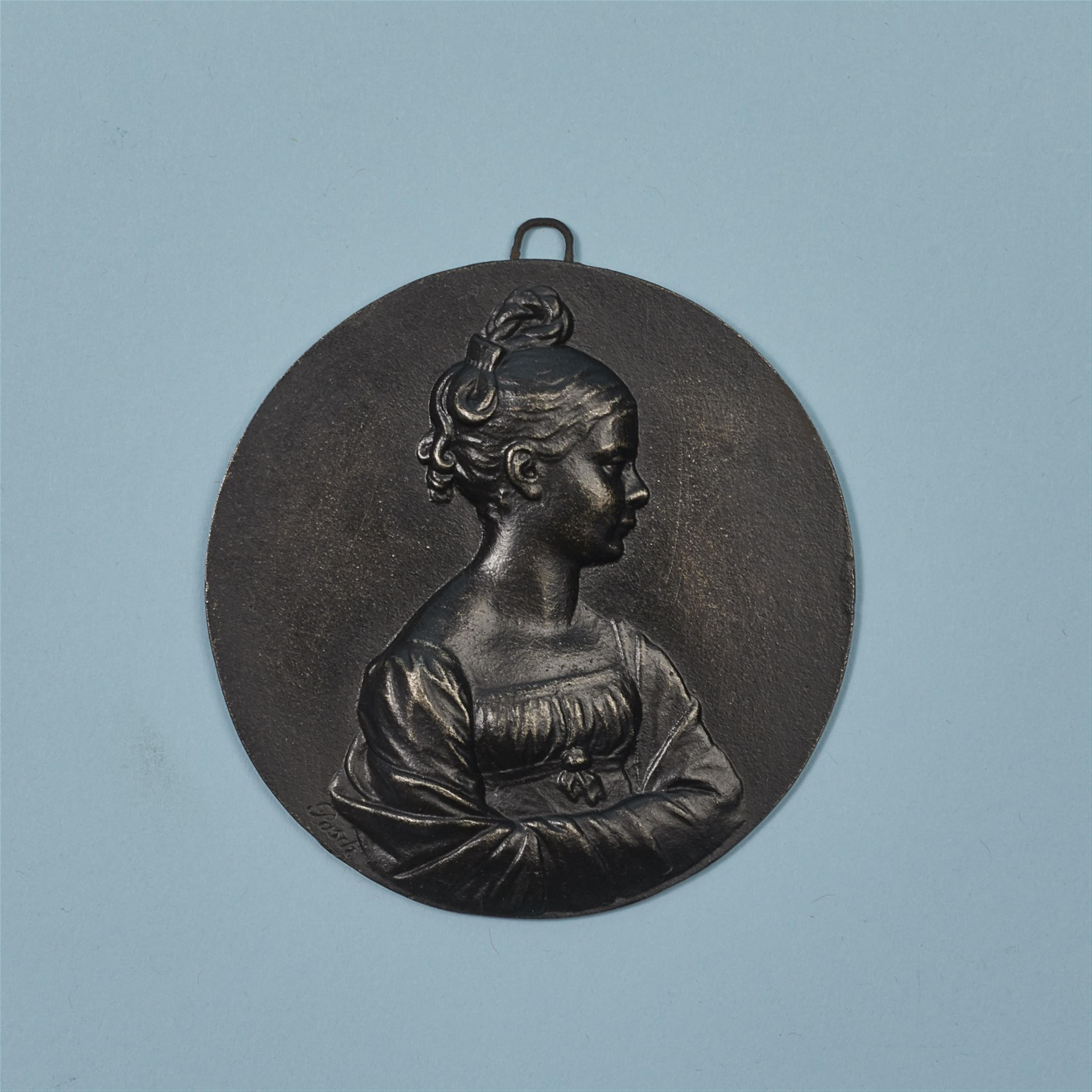 A round cast iron plaque with Princess Luise as a young girl - image-1