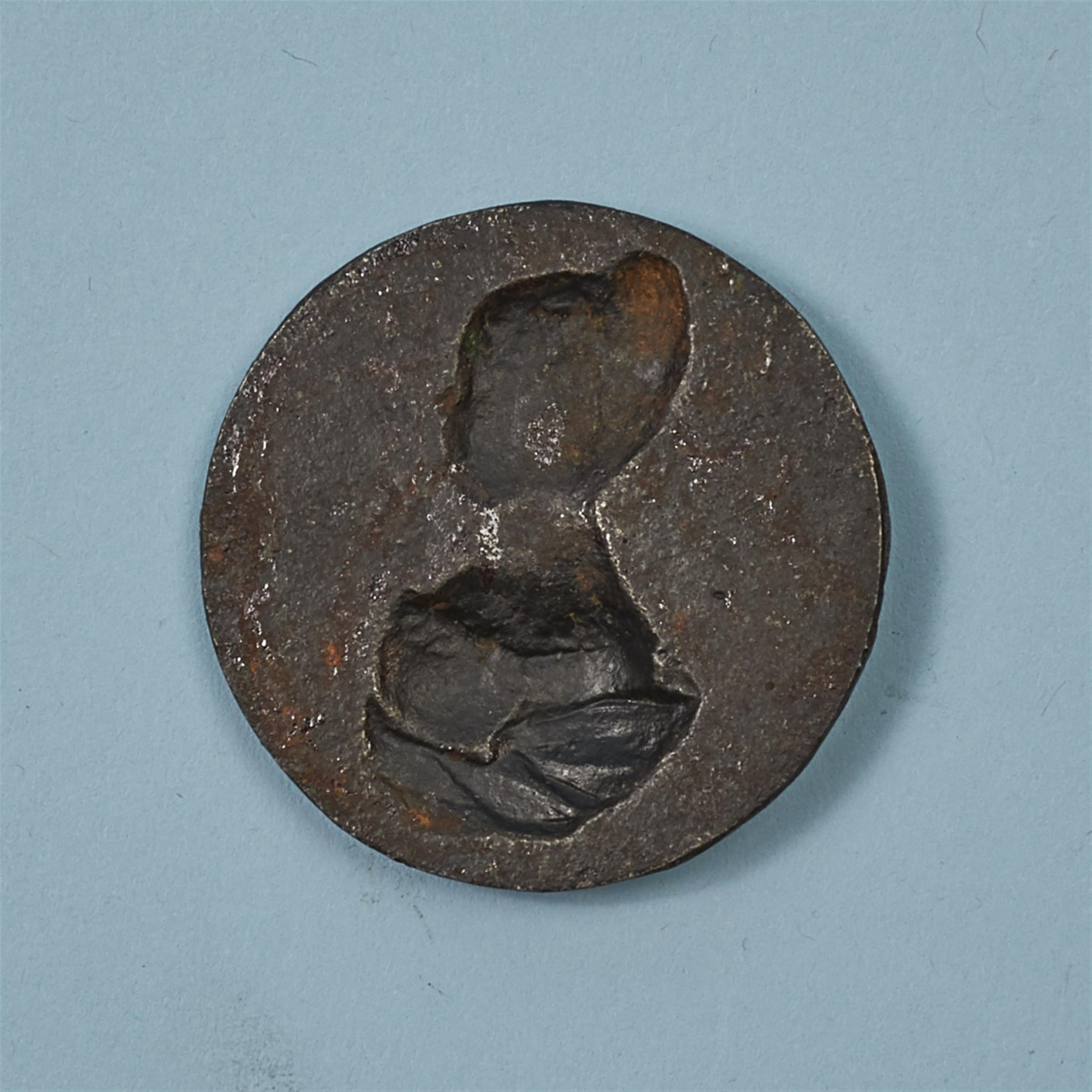A rare small round cast iron plaque - image-2