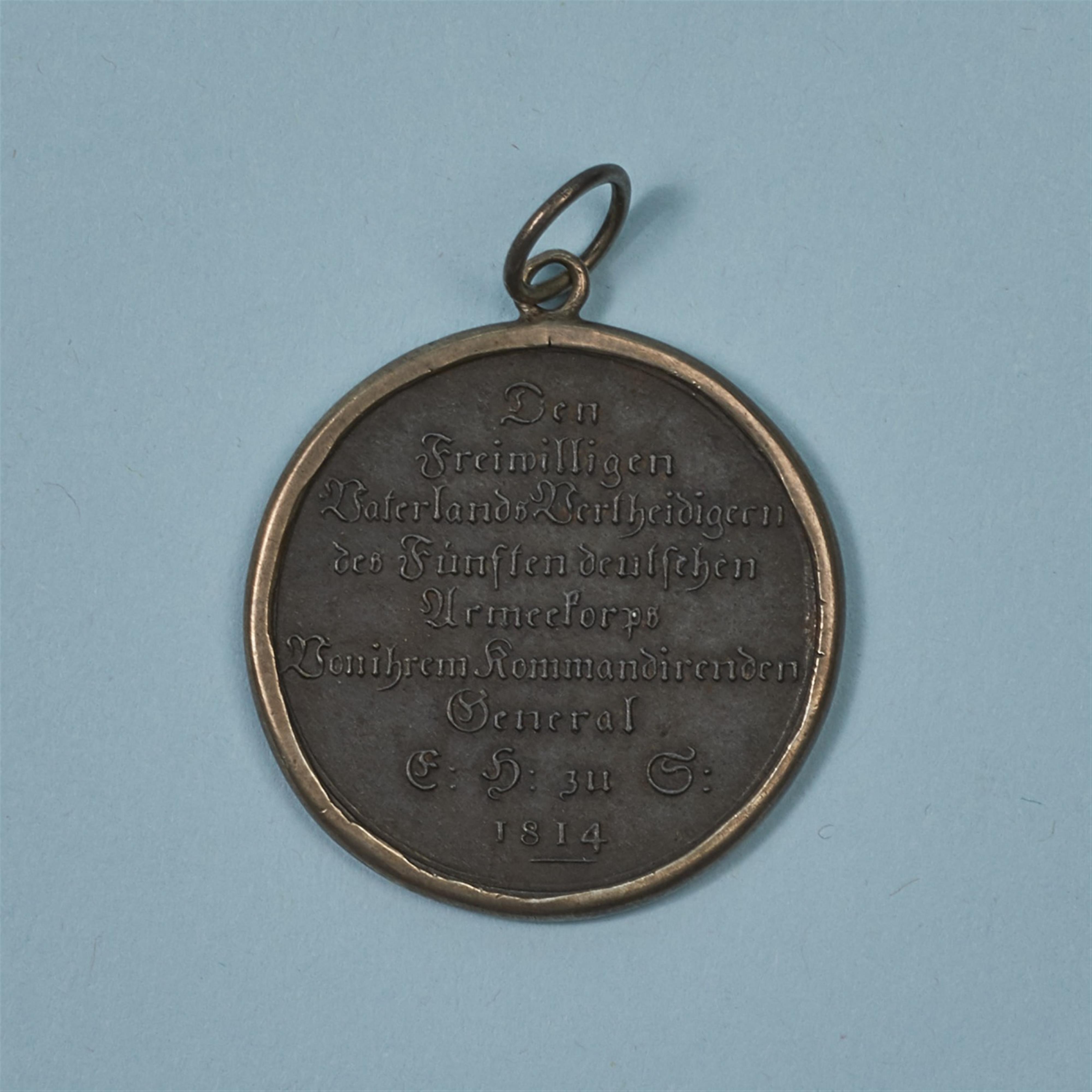 A cast iron medallion inscribed “Einigkeit macht stark” - image-2