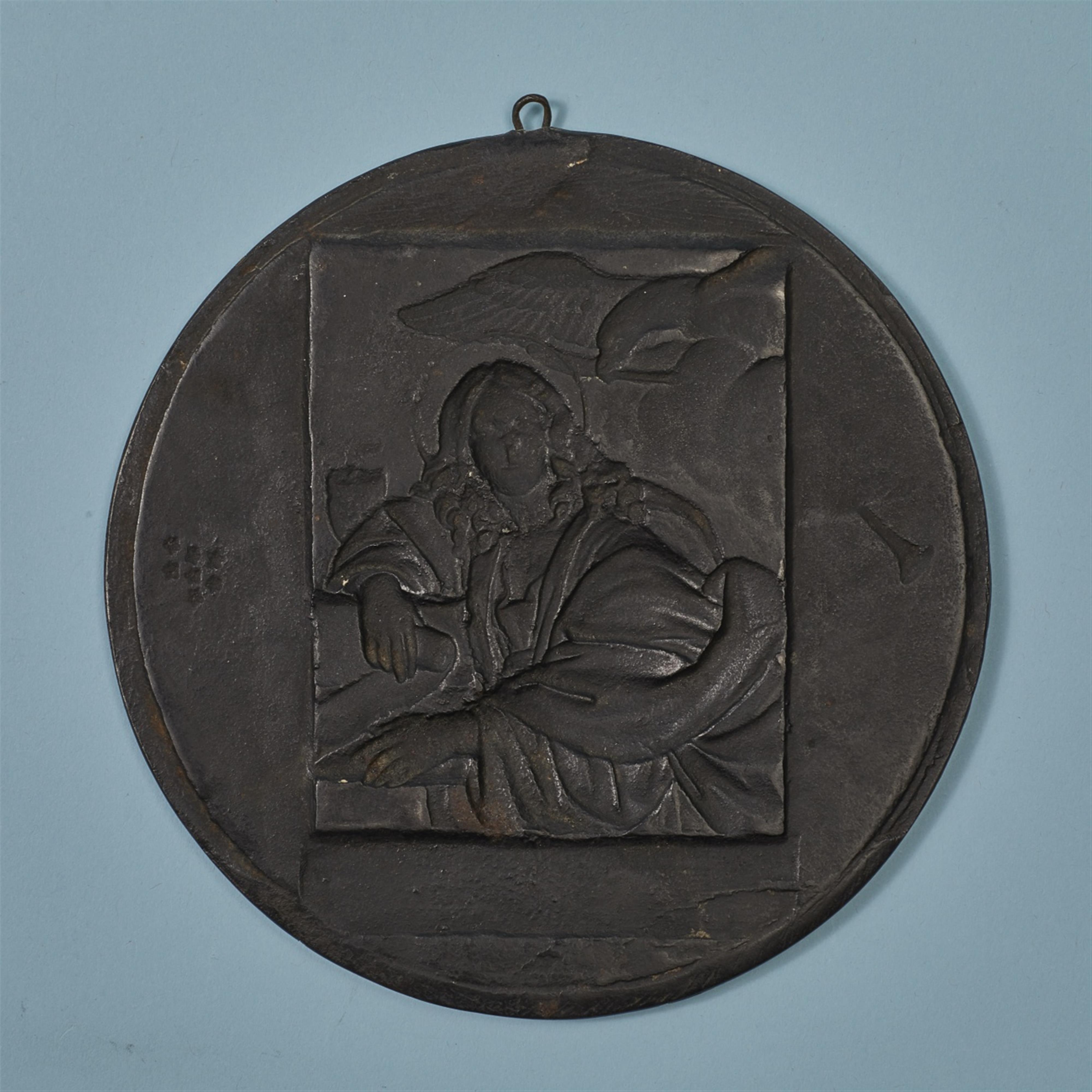 A round cast iron plaque with John the Evangelist - image-2