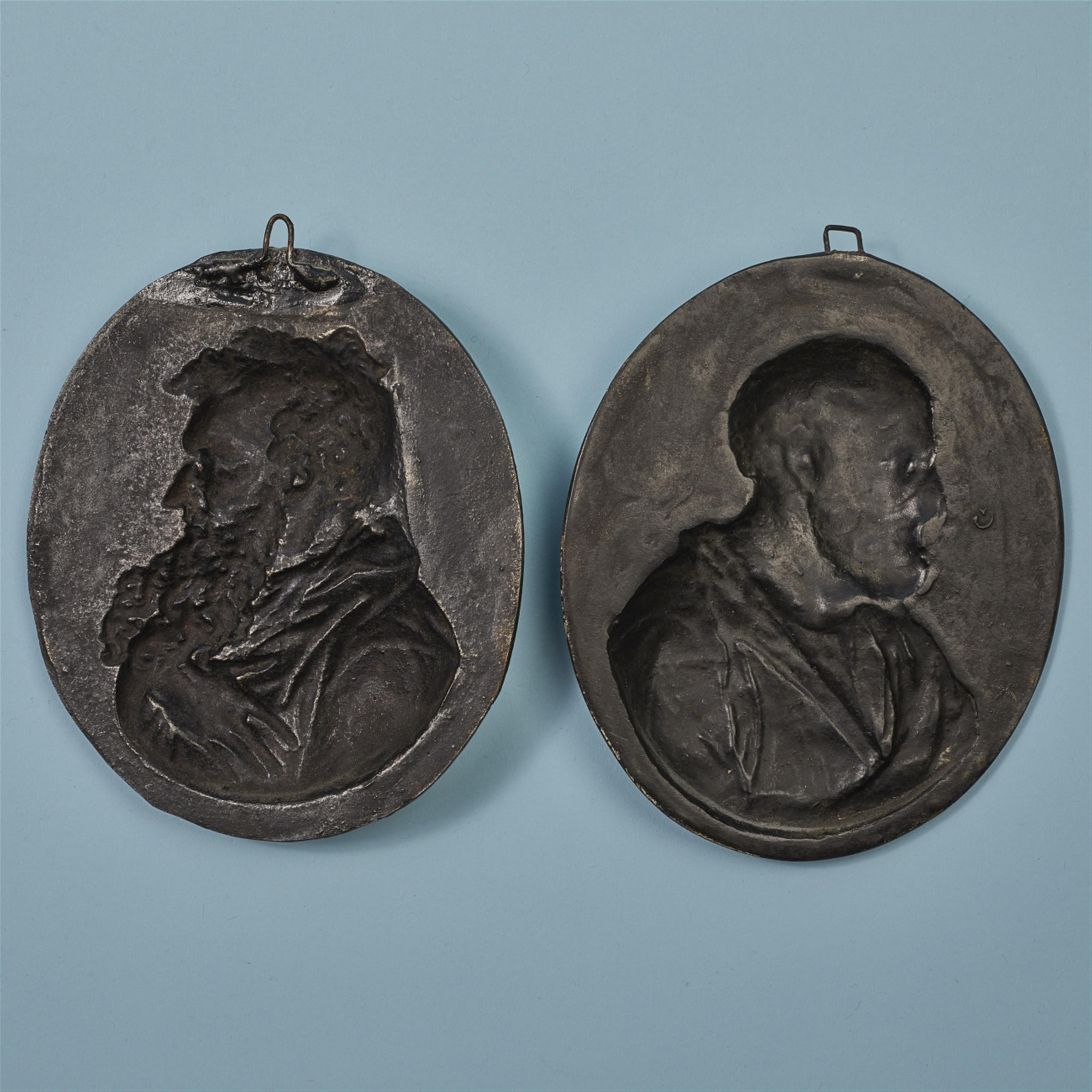 Two oval cast iron plaques - image-2