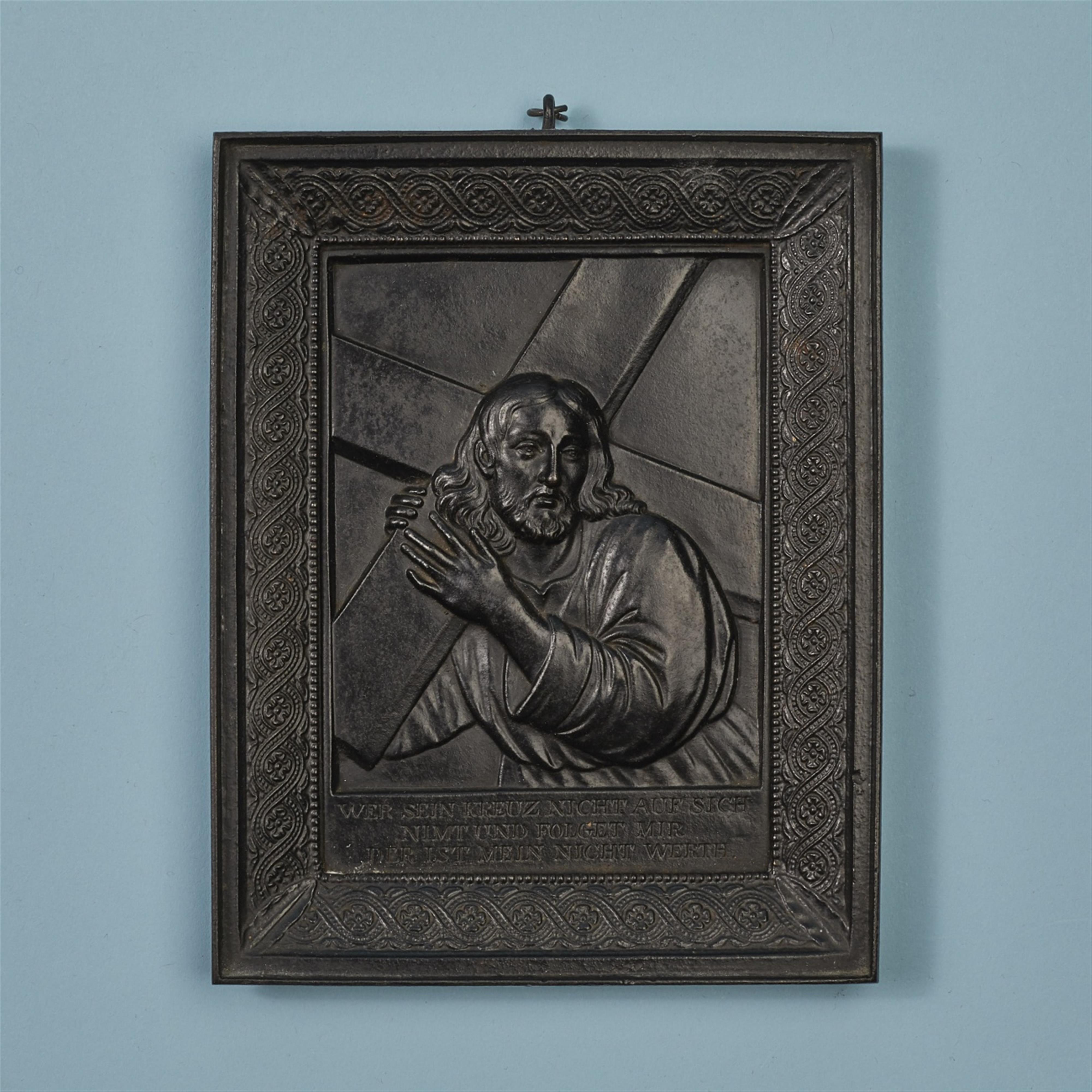 A cast iron plaque with Christ carrying the cross - image-1