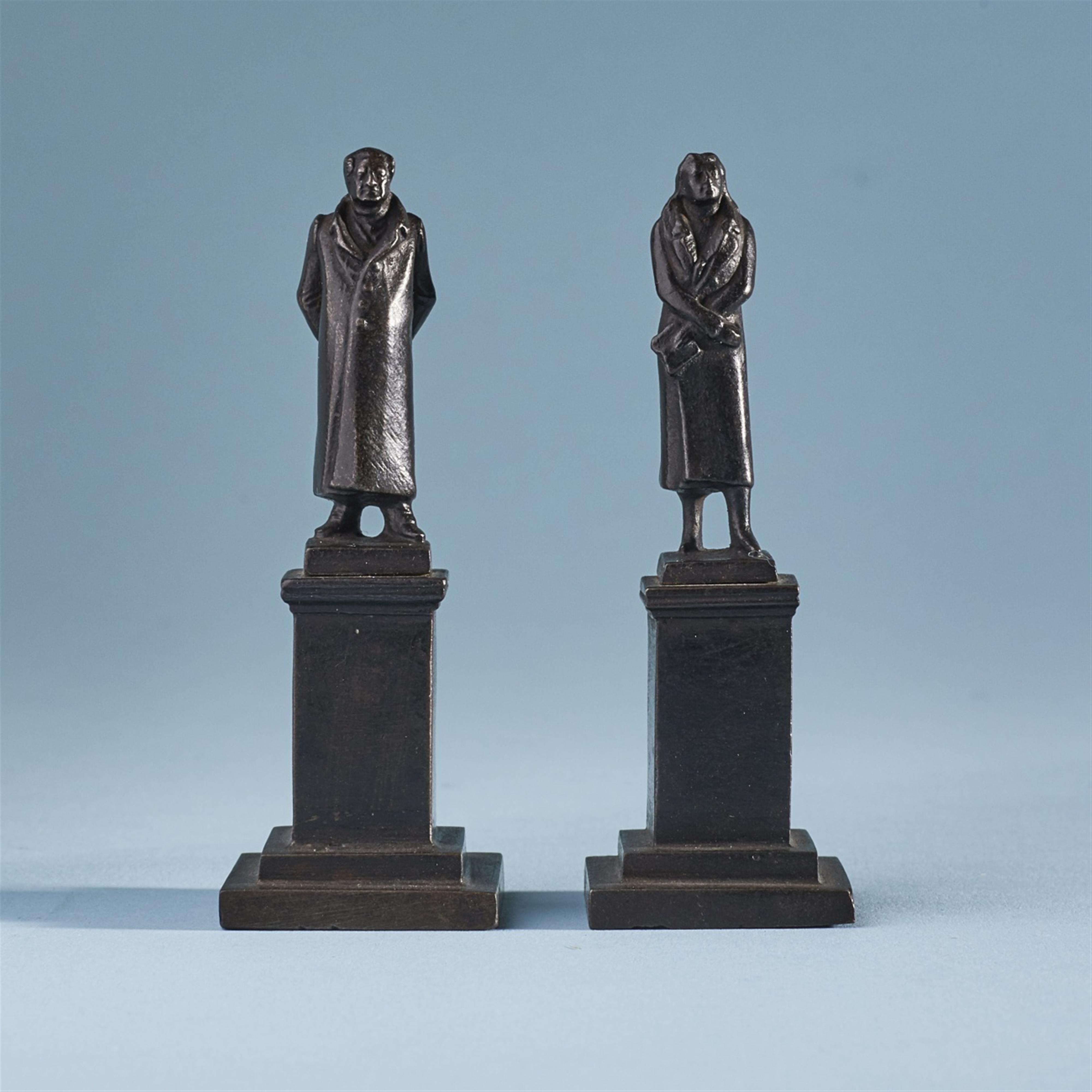 Two miniature cast iron statuettes of Goethe and Schiller - image-1