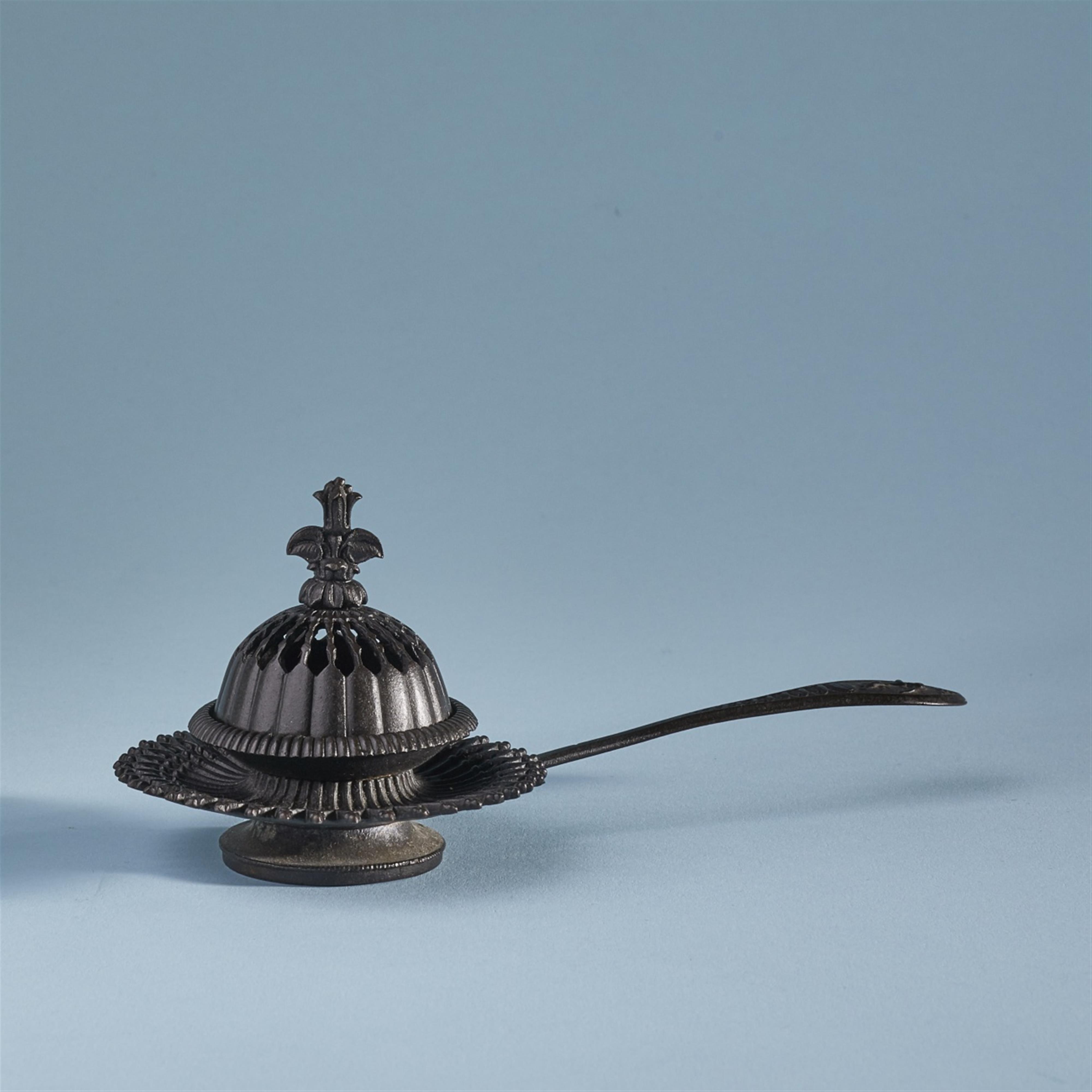A cast iron incense burner - image-1